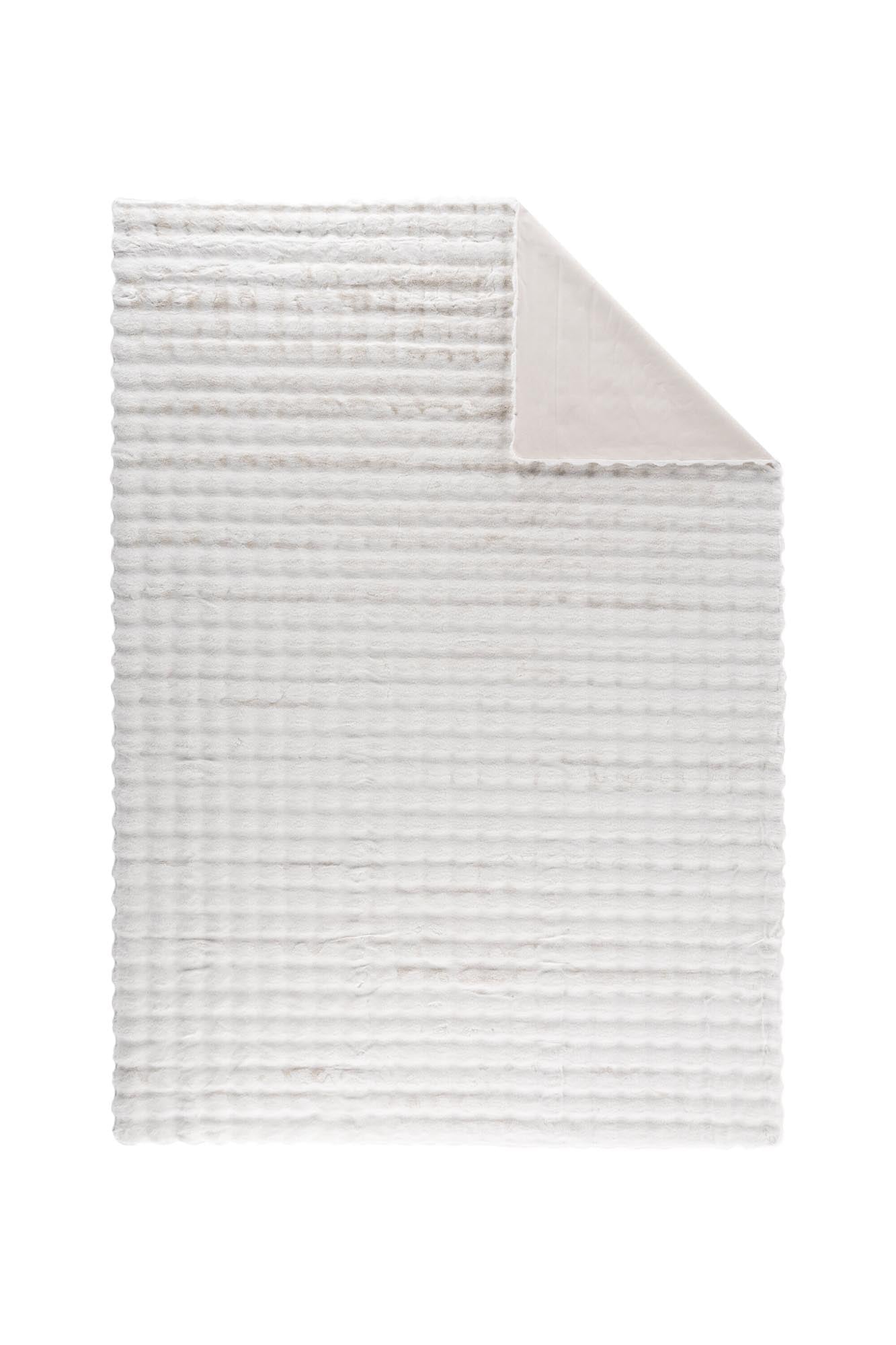 Novis Teppich: Stilvolle Akzente für ein einladendes Wohnambiente.