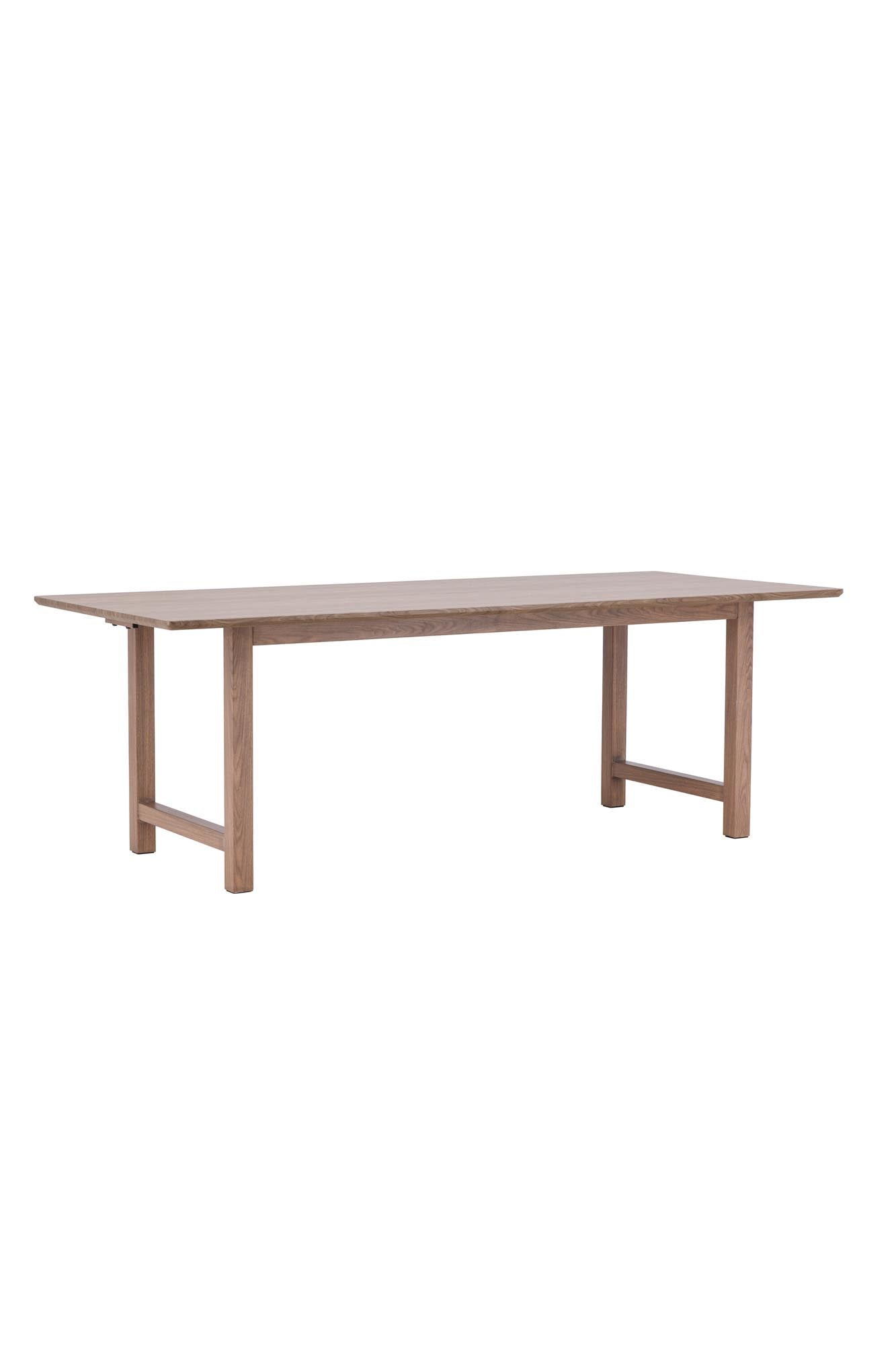 Erleben Sie den Esstisch Count von Venture Home – ein eleganter Tisch mit abgerundeten Kanten, der jedem Essbereich Charme verleiht.