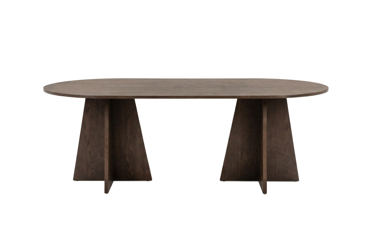Ovaler Esstisch Bootcut in Mokka-Farbton mit MDF-Tischplatte und furnierten Beinen, Grösse 200x100 cm, Platz für sechs Personen.