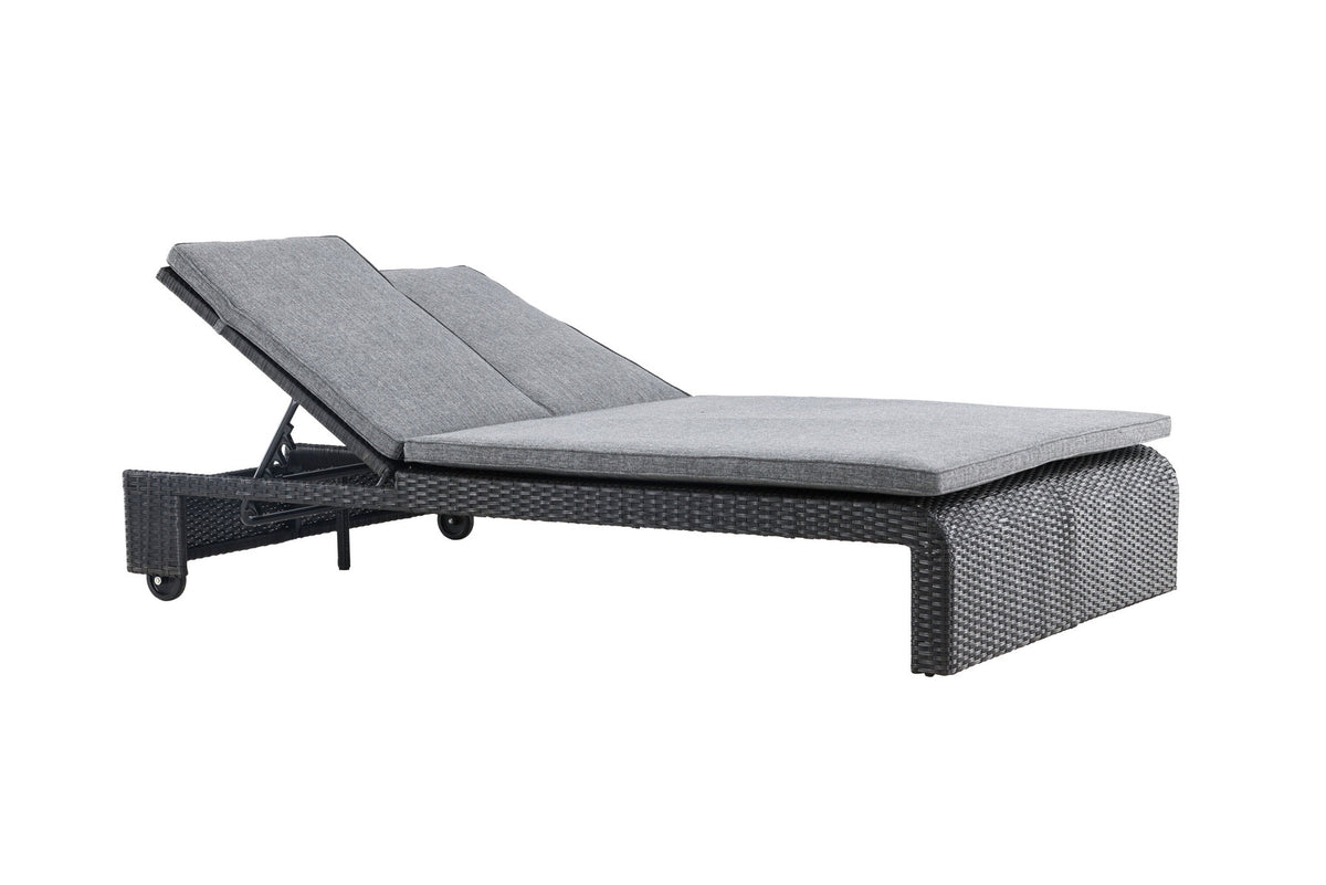 Sonnenliege London von Venture Home in Schwarz mit grauem Kissen und Korbgeflecht