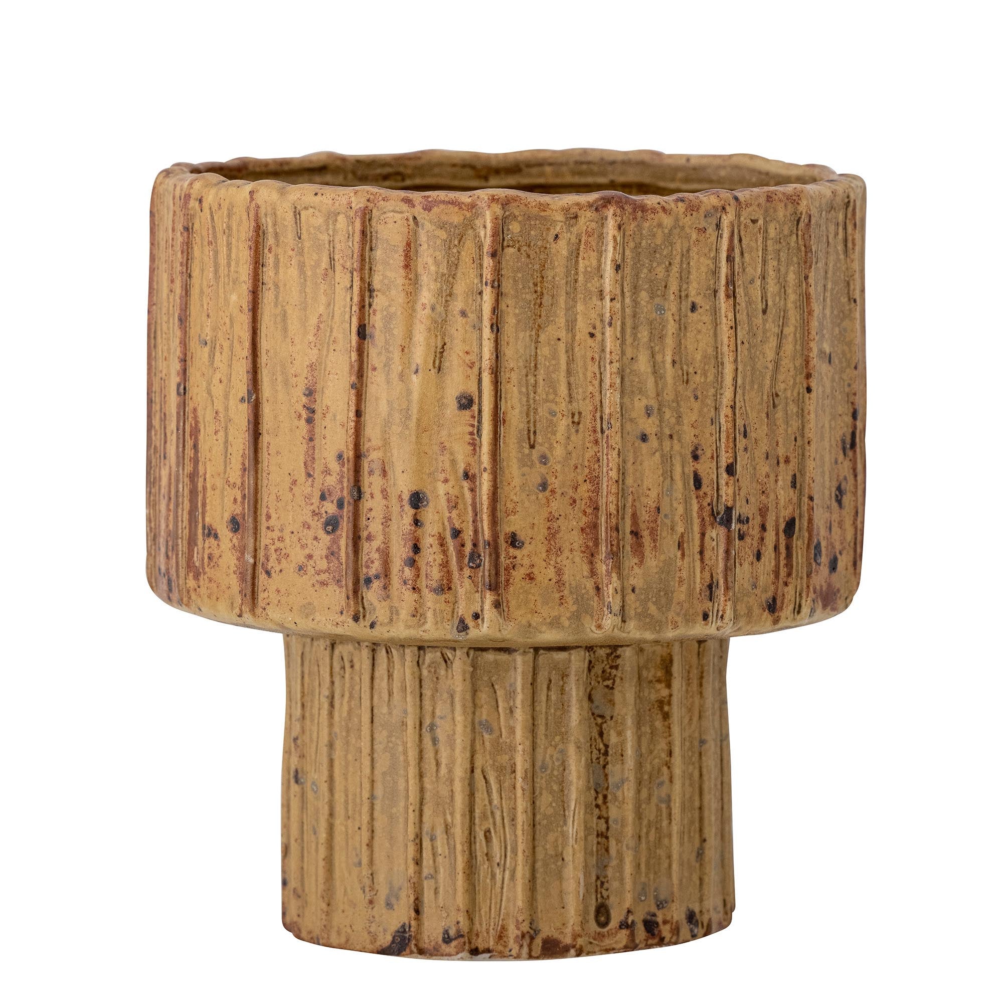 Entdecken Sie den stilvollen Elitta Blumentopf aus braunem Steingut von Creative Collection. Ideal für kleine bis mittelgroße Pflanzen, bringt er natürliche Eleganz in Ihr Zuhause.