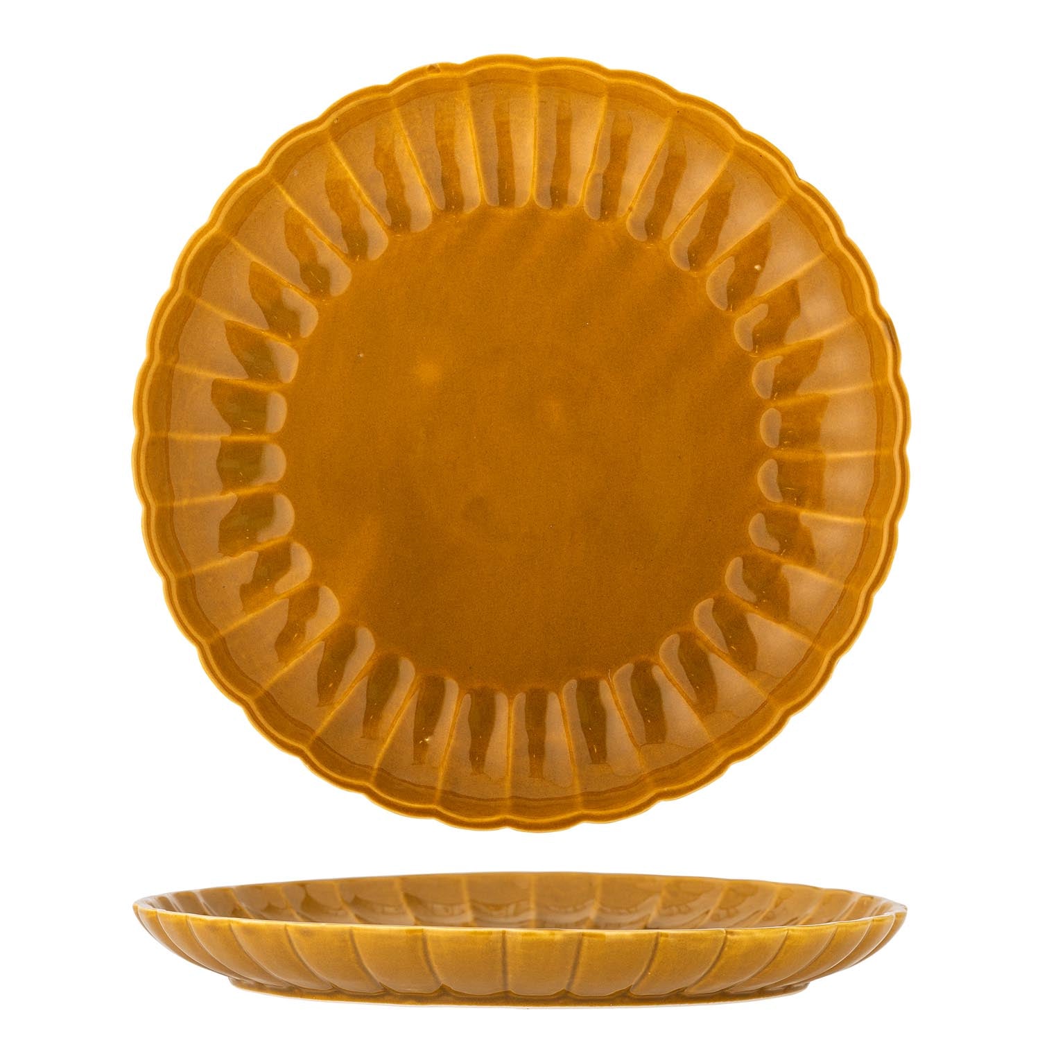 Der Latina Teller von Bloomingville in Gelb aus Steingut besticht durch sein modernes Design und ist perfekt für stilvolle Tischarrangements.