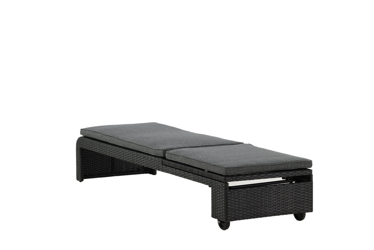 Sonnenliege London von Venture Home in Schwarz mit grauem Kissen und Korbgeflecht