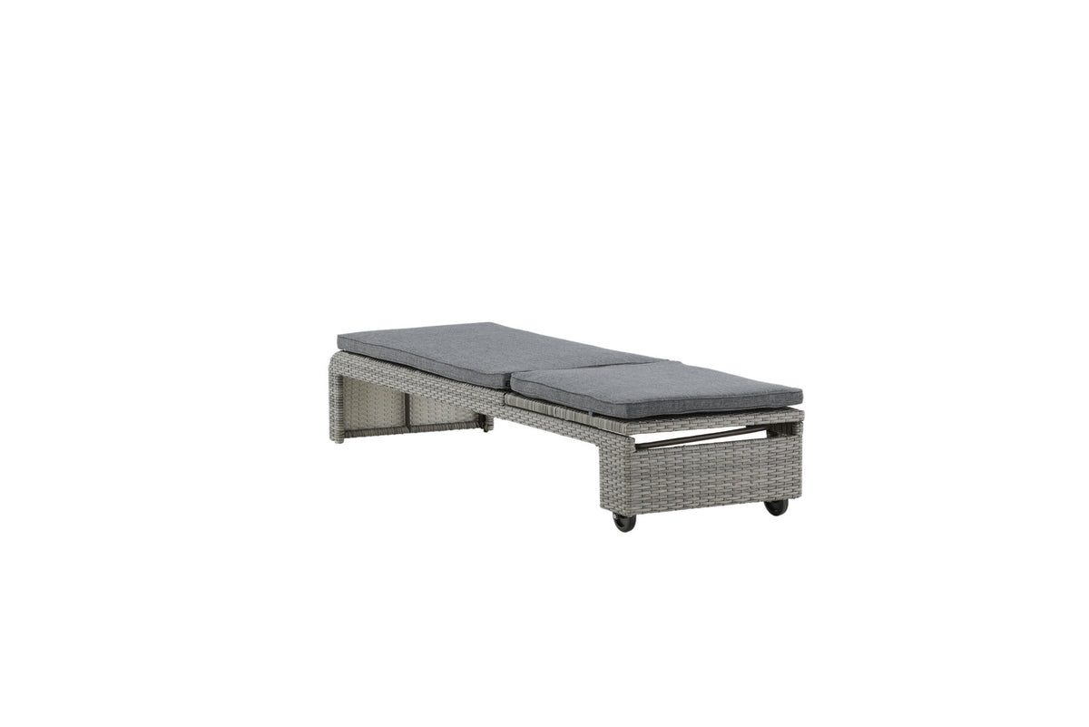 Sonnenliege London von Venture Home in Schwarz mit grauem Kissen und Korbgeflecht