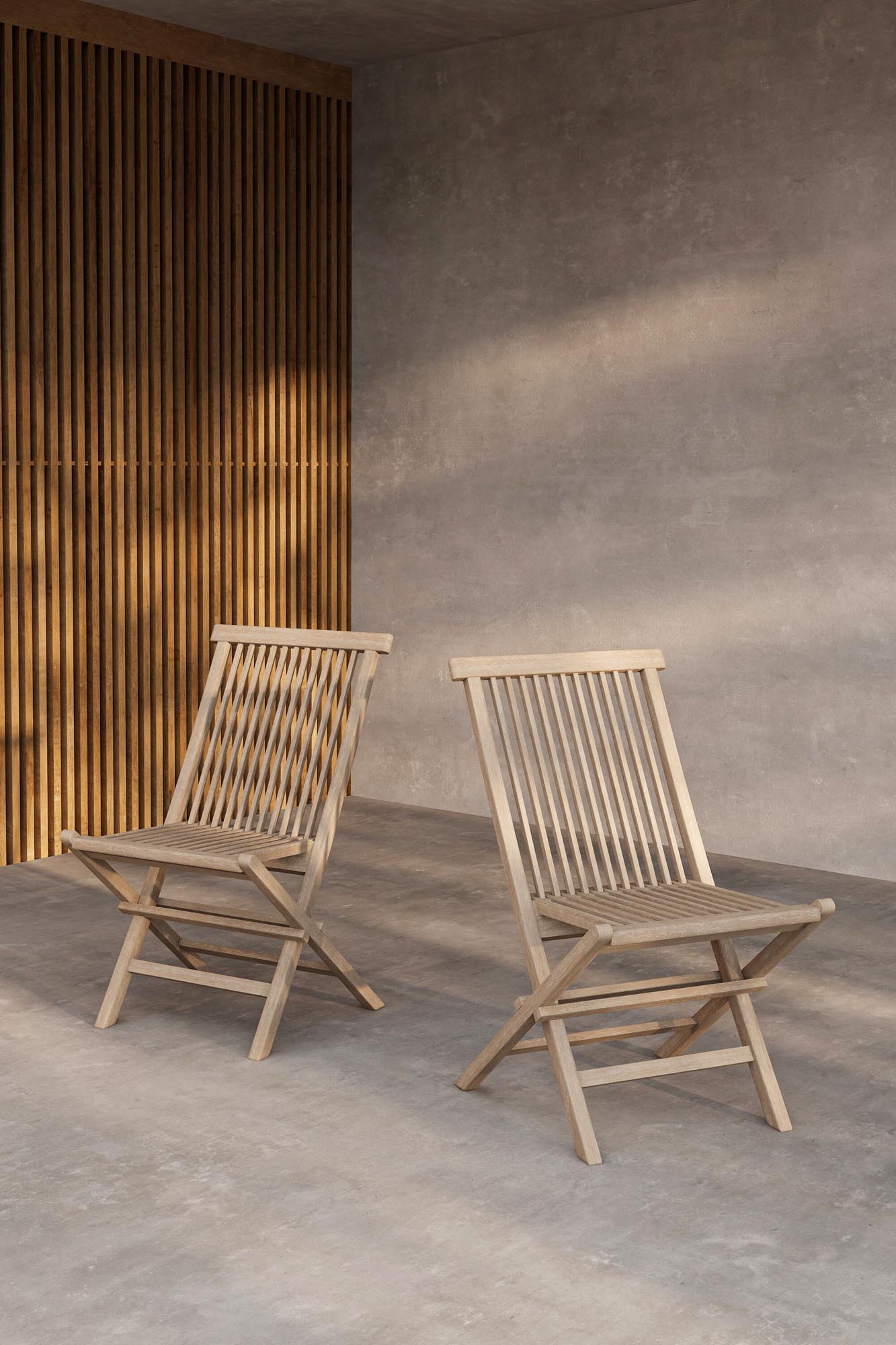 Stilvoller Gartenstuhl aus hochwertigem Teakholz mit modernem Whitewash-Finish. Witterungsbeständig und ideal für entspannte Stunden im Freien.