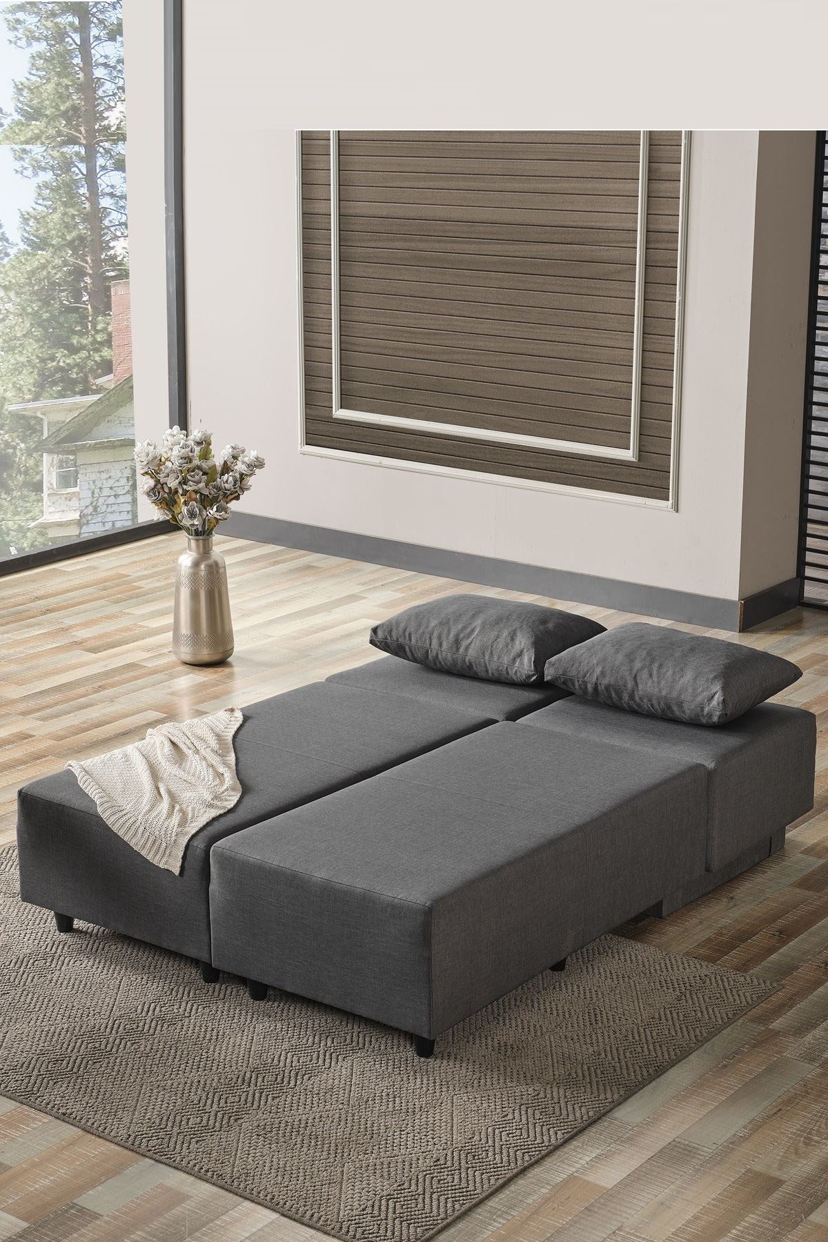 Dunkelgraues Eckschlafsofa Poly M von Hanah Home mit Metallgestell und Polyesterbezug in Leinenstruktur, klassische Ecksofa-Form mit Sitz- und Rückenkissen.