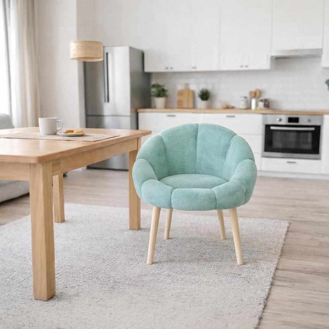 Grüner Ohrensessel im Wing-Chair-Design mit Wellsoft-Bezugsstoff, Gestell aus melaminbeschichteter Spanplatte und Beinen aus Eschenholz.