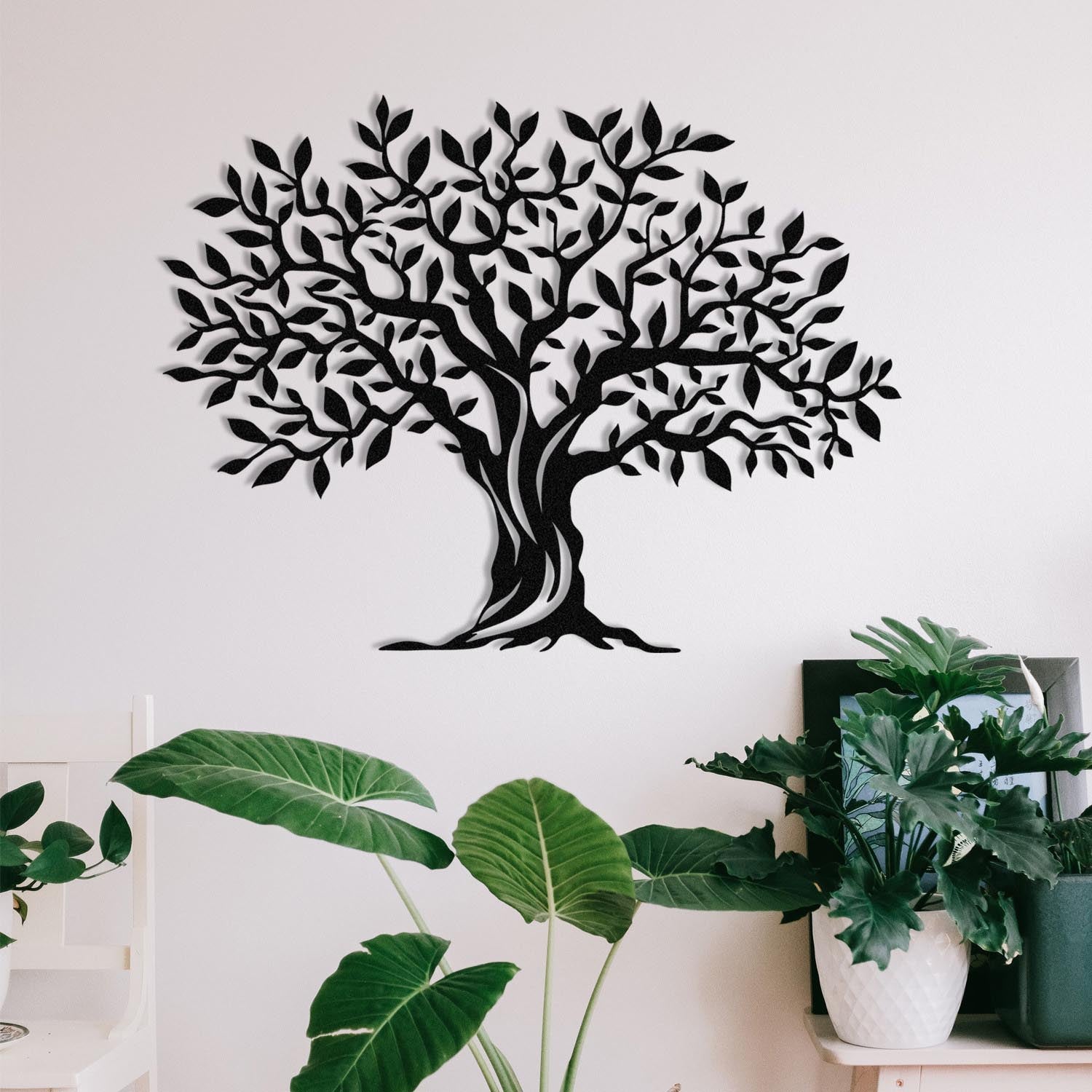 Entdecken Sie die elegante Yaprak Dokumu Wanddeko in Schwarz von Wallity. Verleihen Sie Ihrem Raum mit diesem stilvollen Metall-Accessoire einen Hauch von Raffinesse.