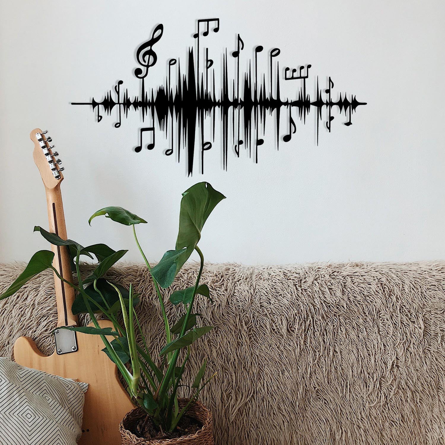 Verleihen Sie Ihrem Raum mit der schwarzen Wanddeko von Wallity einen Hauch von Eleganz. Dieses hochwertige Metall-Accessoire ist der perfekte Blickfang für jedes Zuhause.