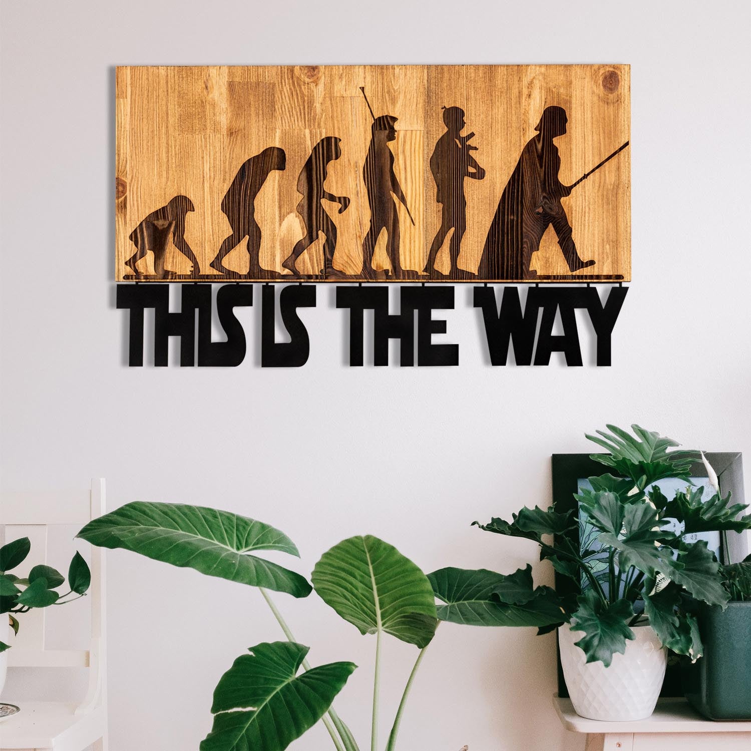 Entdecken Sie die Evrim Wanddeko von Wallity – ein elegantes Holz-Wandaccessoire, das Stil und Raffinesse in Ihr Zuhause bringt.