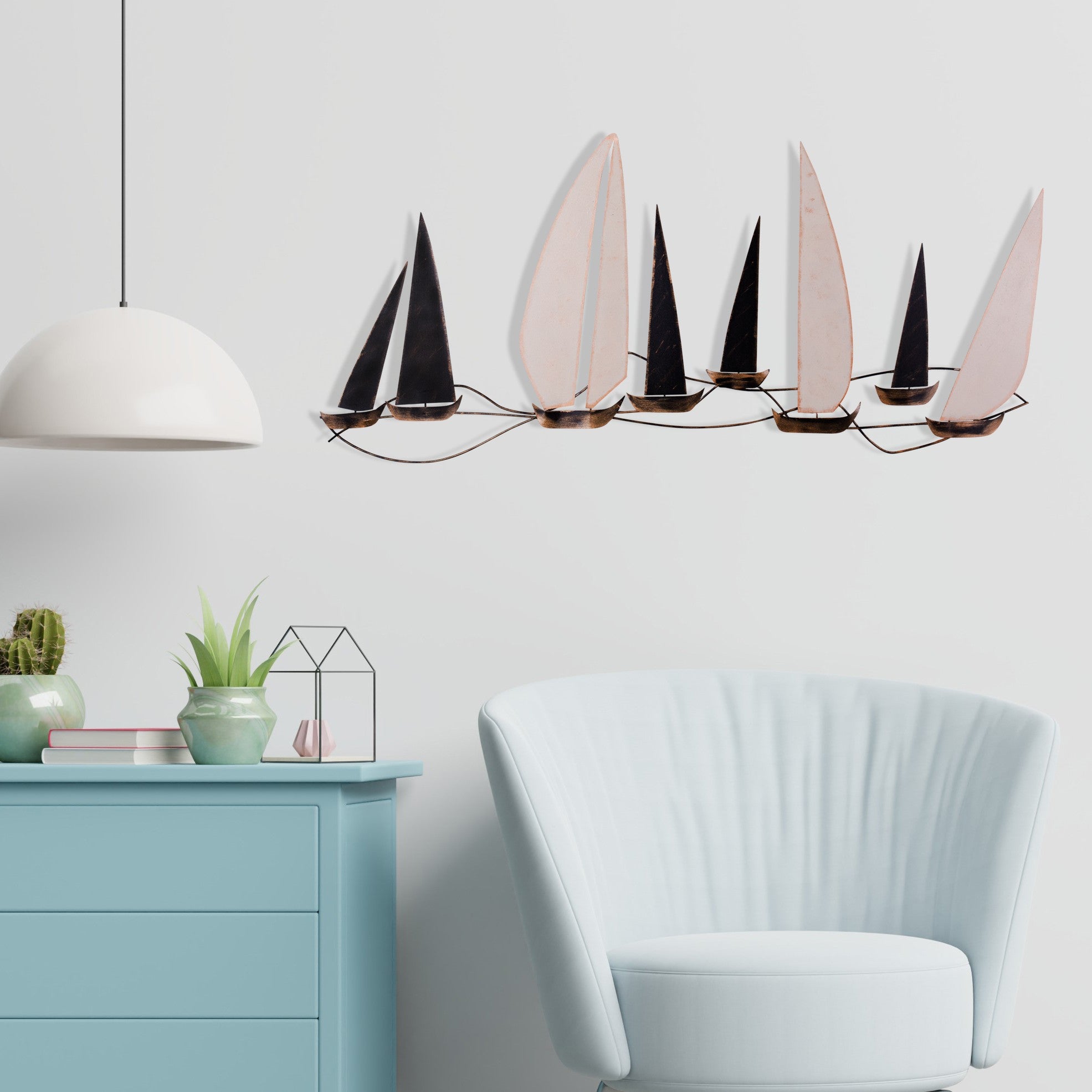 Entdecken Sie die Ocean Wanddeko von Wallity – ein handgefertigtes Metallkunstwerk, das jedem Raum Eleganz und Stil verleiht.