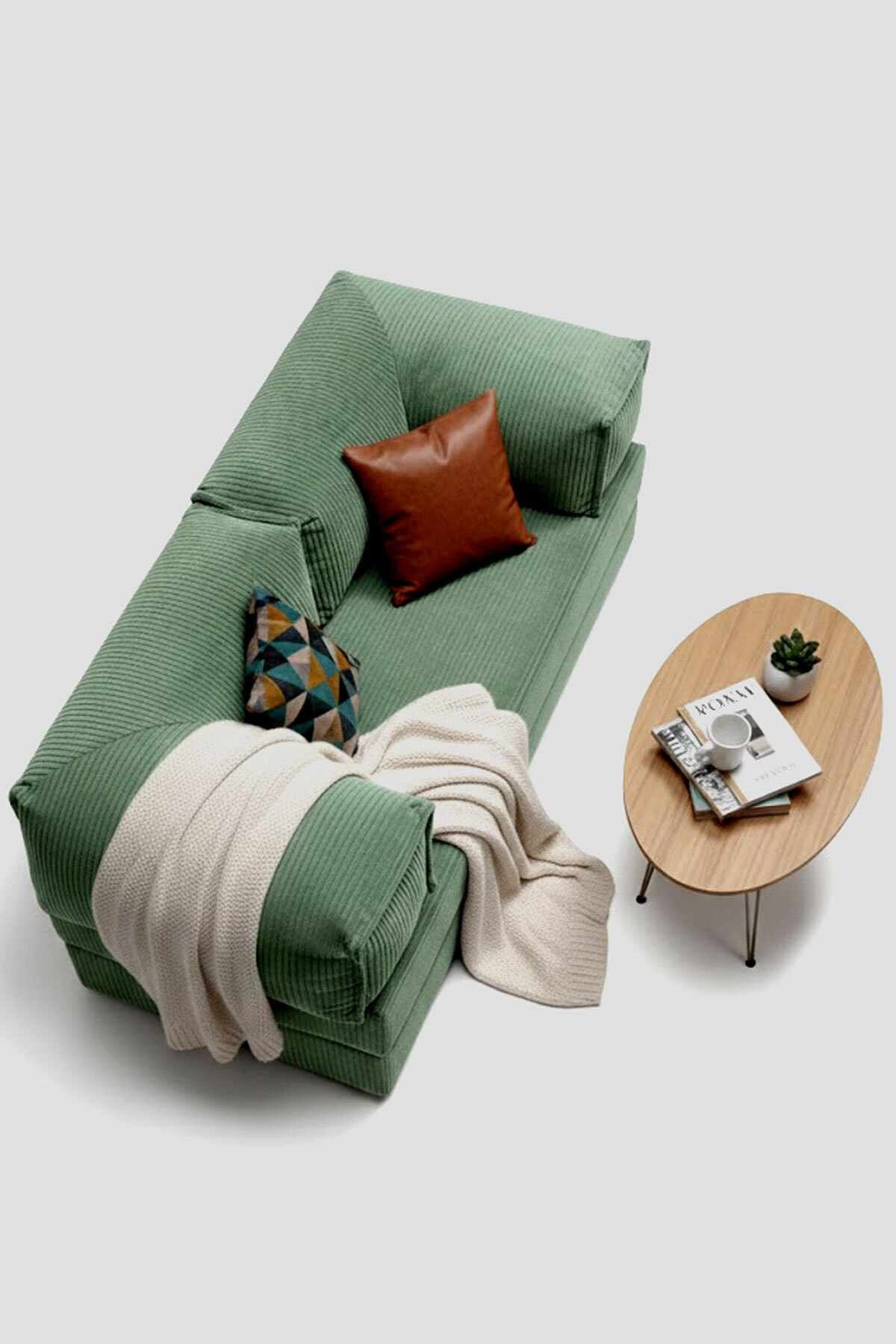 Grünes 2-Sitzer Sofa Milano von Hanah Home mit Bezug aus Polyester und Leinen, zwei Kissen und rutschfester Sohle auf hellem Hintergrund.