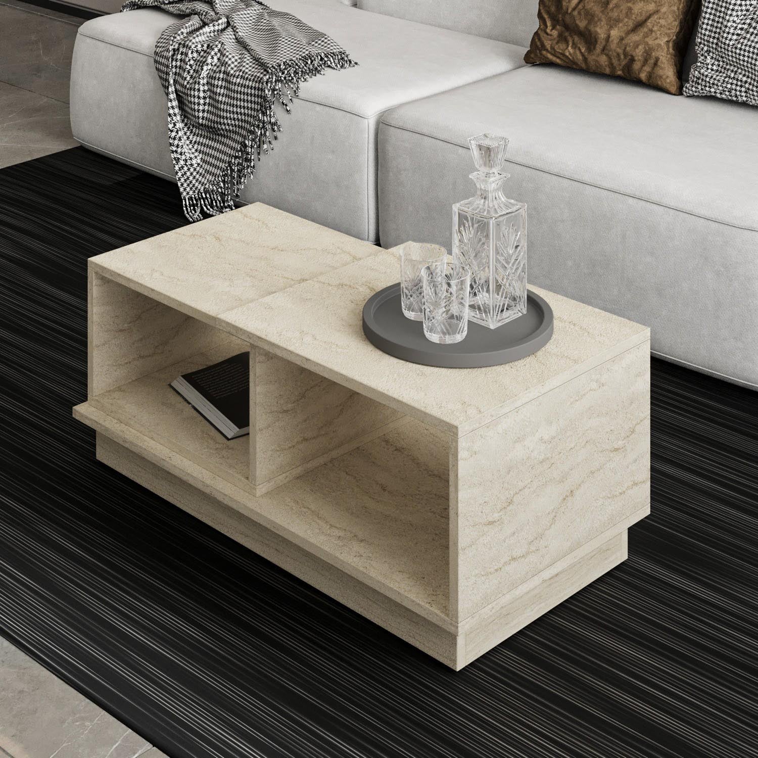 Entdecken Sie den Consept Sofatisch aus Travertin von Hanah Home – ein stilvolles Möbelstück, das Eleganz und Funktionalität vereint.