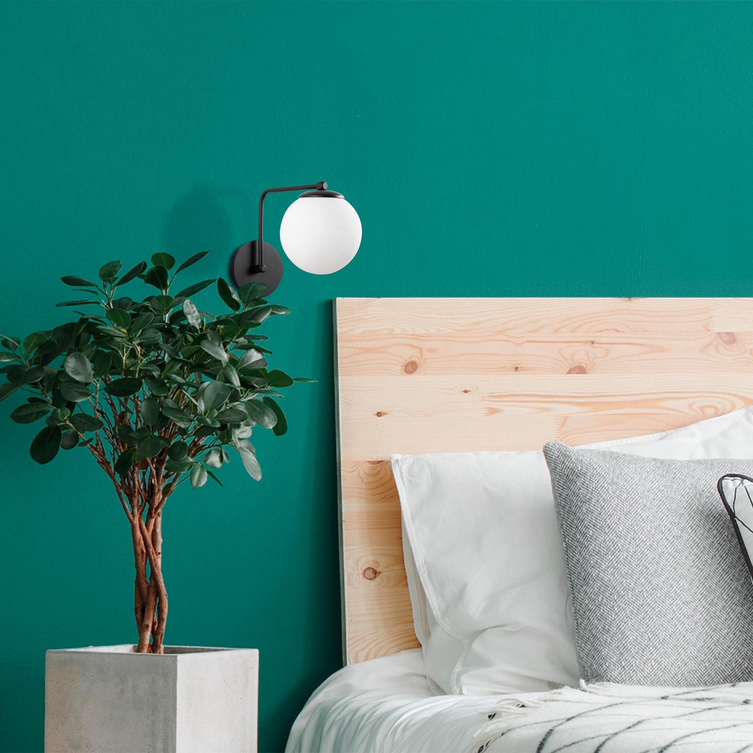 Verleihen Sie Ihrem Raum mit der Daisy Wandleuchte in Schwarz von Opviq einen Hauch von industriellem Flair und skandinavischer Raffinesse.