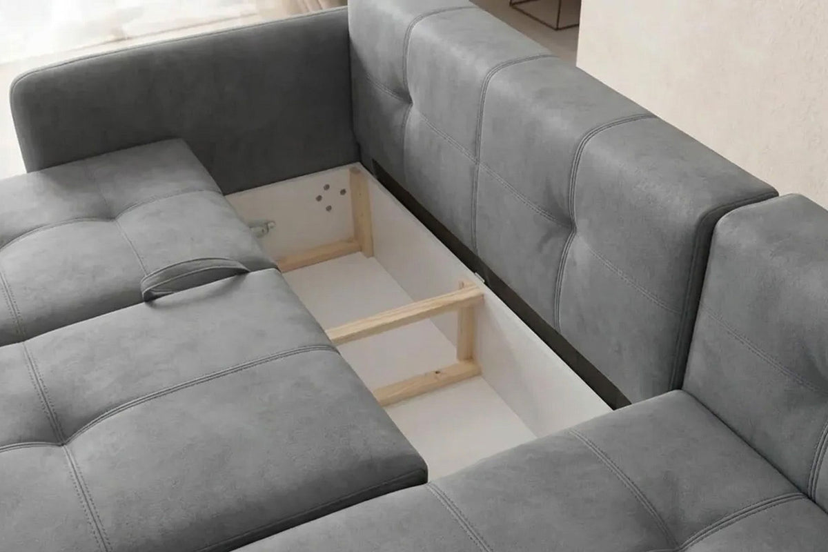 Graues Eck-Schlafsofa mit Polyesterbezug, Buchenholzgestell, Staufach unter der Sitzfläche und zwei Kissen, rechts ausgerichtet.