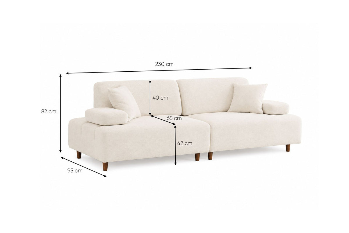 Cremefarbenes 3-Sitzer-Sofa Madlen von Hanah Home mit Polyesterbezug, Kunststoffbeinen und zwei Kissen auf Buchenholzgestell