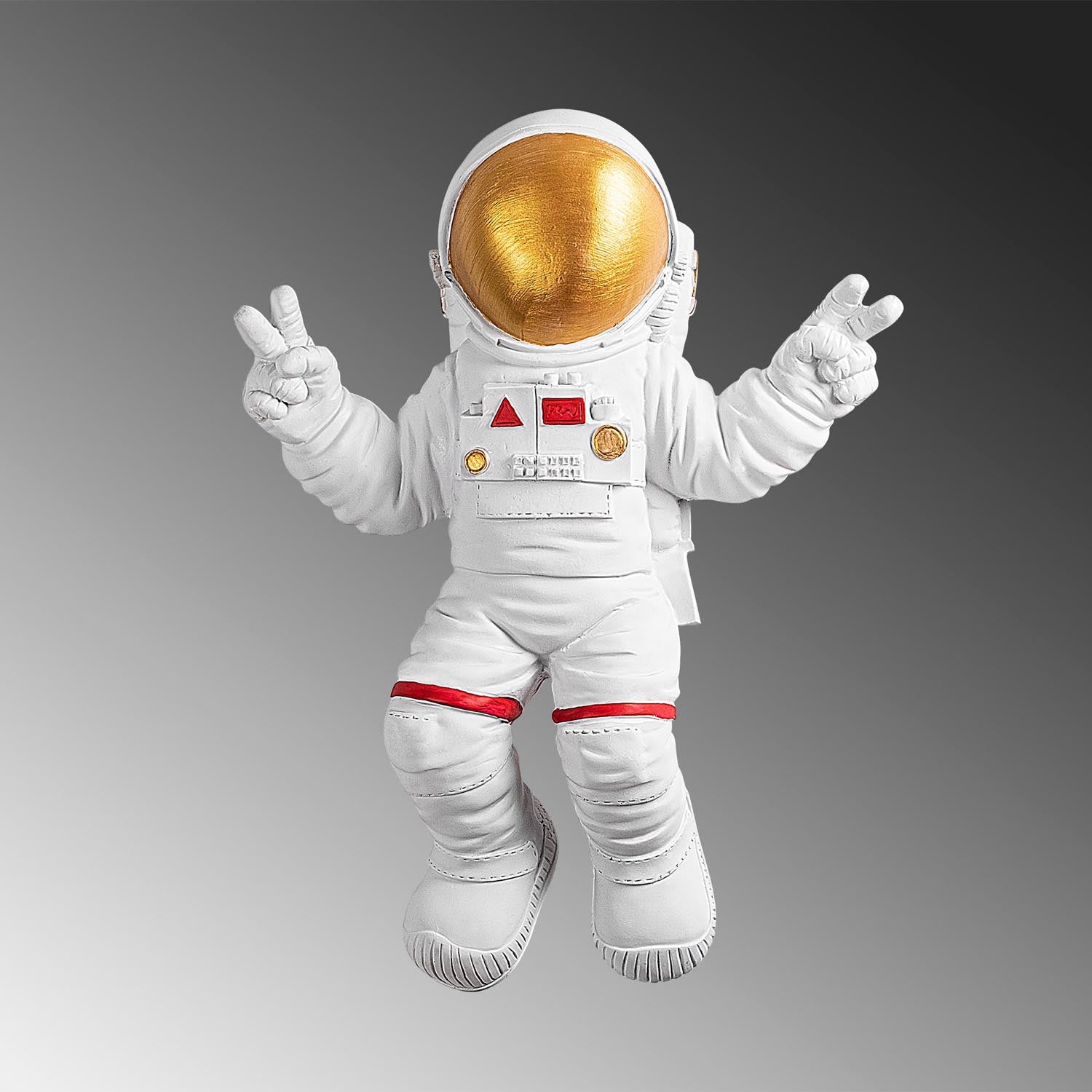 Verwandeln Sie Ihr Zuhause mit der eleganten Wanddeko "Peace Sign Astronaut" von Wallity in edlem Weiß und Gold – ein Blickfang für jeden Raum!