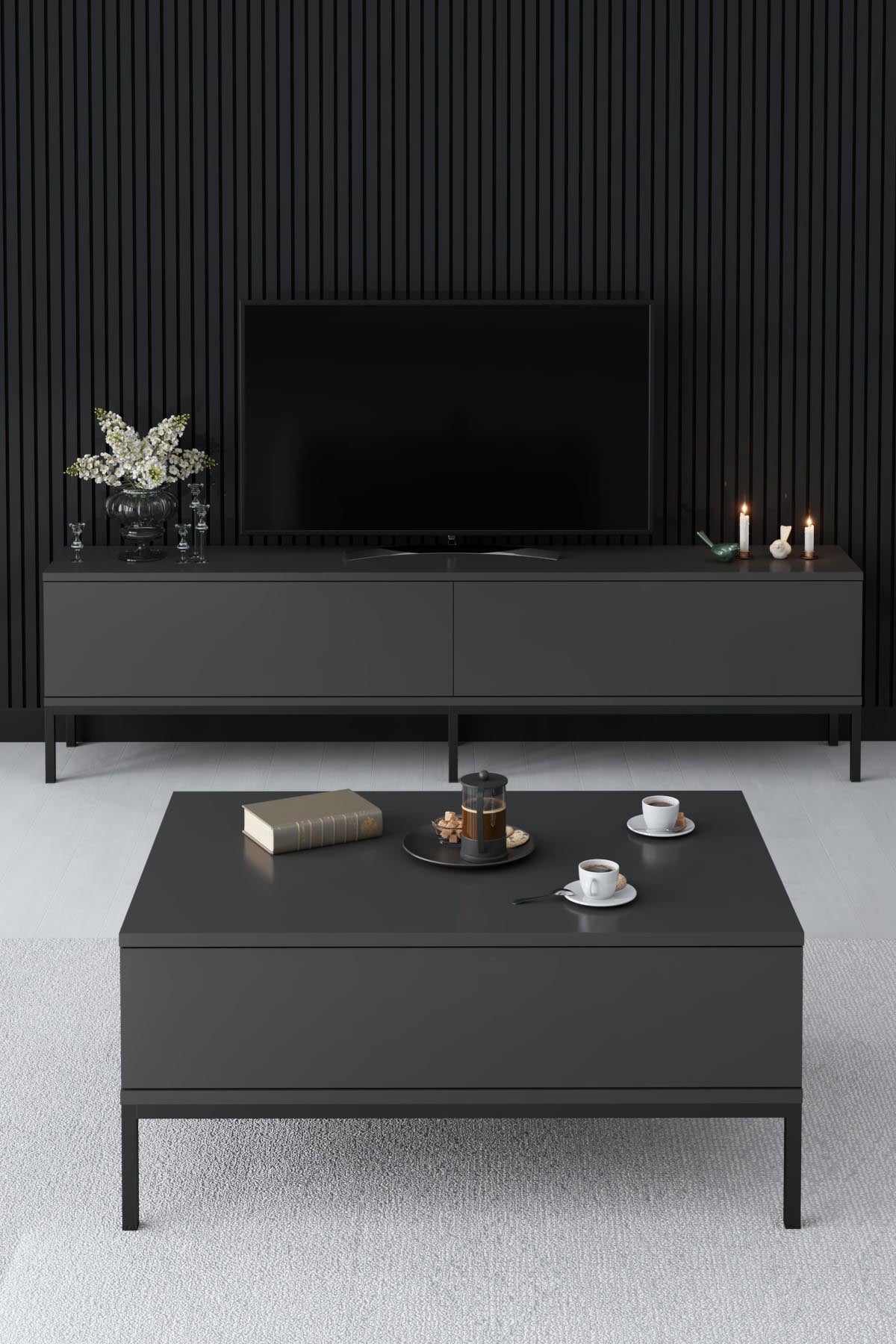 Verleihen Sie Ihrem Wohnraum mit dem TV-Ständer Lord in Anthrazit und Schwarz von Hanah Home einen modernen Akzent. Funktionalität trifft auf elegantes Design!
