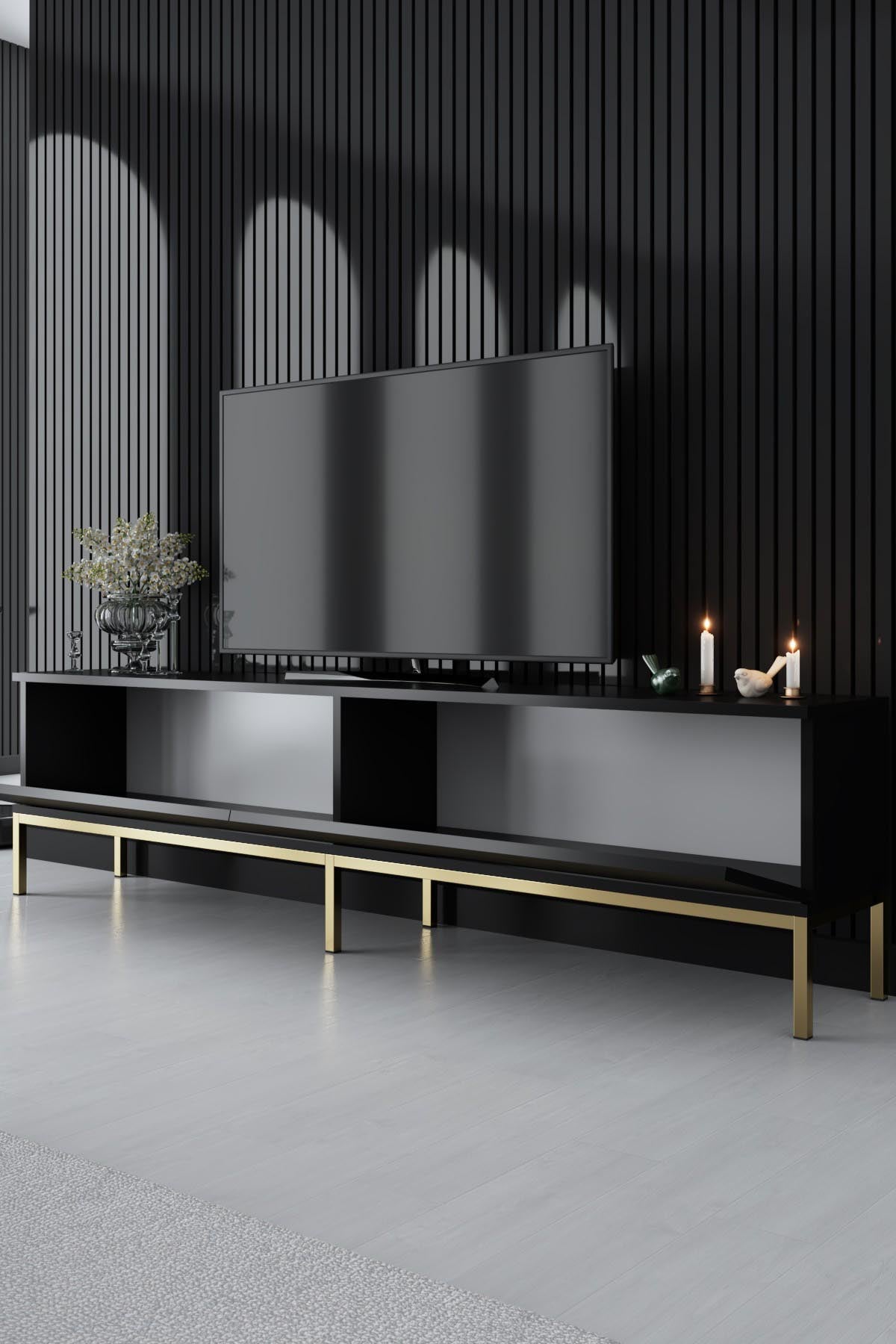 Stilvoller TV-Ständer Lord - Black, Gold von Hanah Home: Robuste melaminbeschichtete Spanplatte, glamouröse Metallfüße, perfekte Kombination aus Eleganz und Funktionalität.