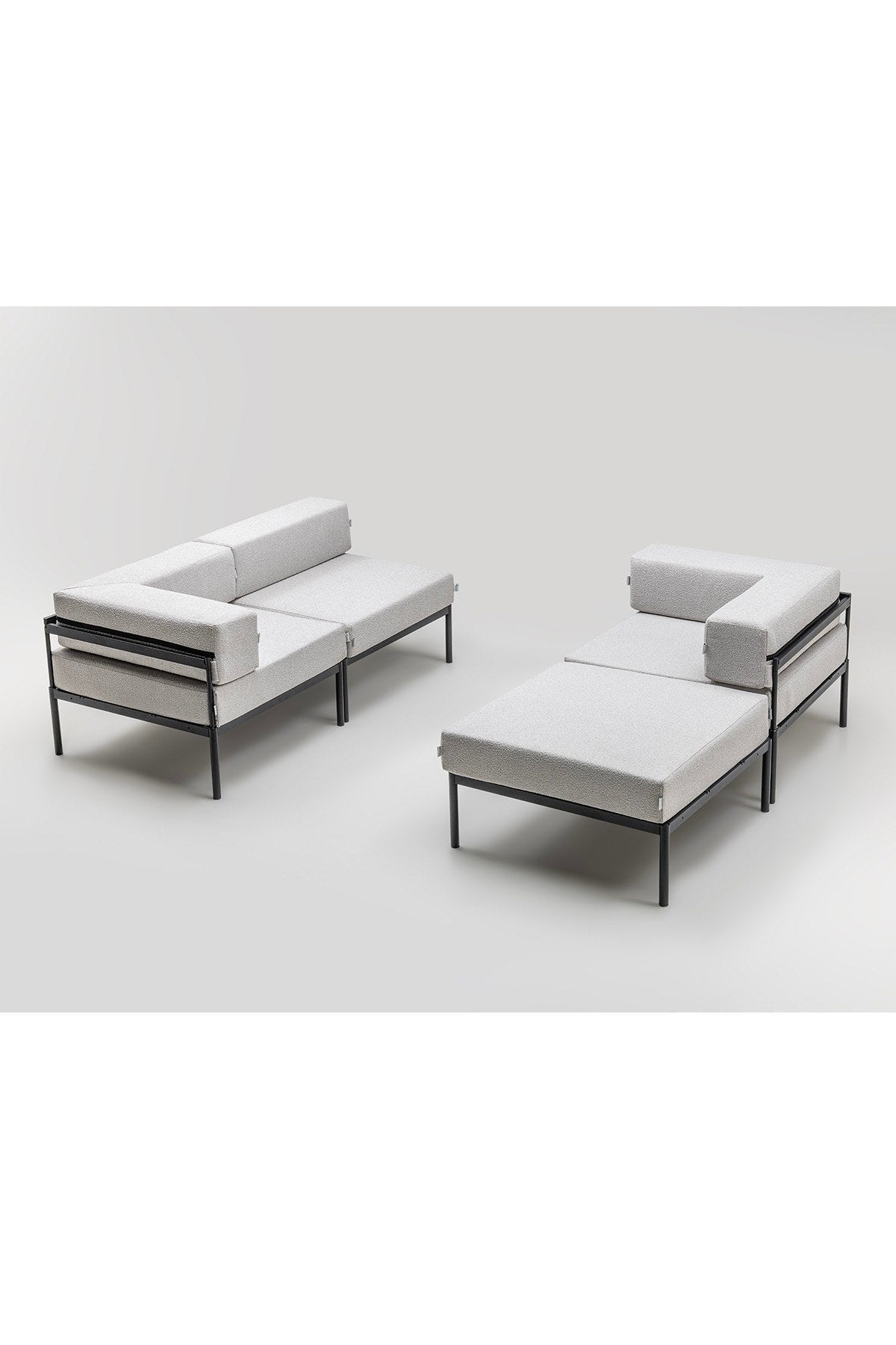 Ecksofa Corner Set 270 von Hanah Home in Schwarz und Grau, Bouclé-Stoff, Metallbeine, breite Sitzfläche und Rückenlehne.