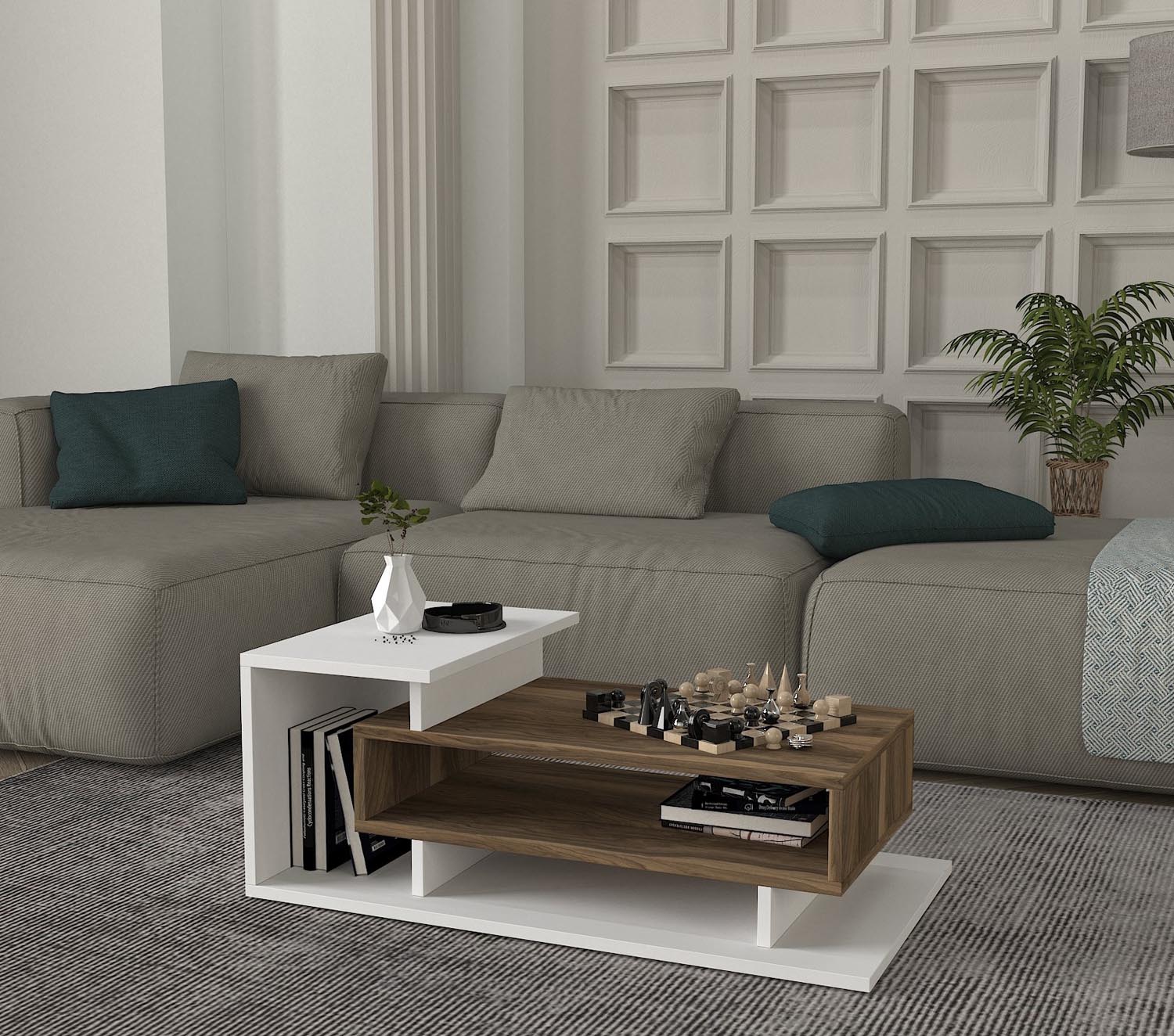 Verleihen Sie Ihrem Wohnraum mit dem stilvollen Couchtisch Spring - White, Walnut von Hanah Home einen modernen Akzent. Ideal für jeden Einrichtungsstil!