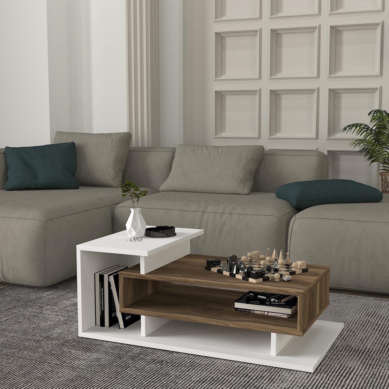 Entdecken Sie den stilvollen Couchtisch Spring - White, Walnut von Hanah Home, der Eleganz und praktische Vielseitigkeit in Ihr Zuhause bringt!