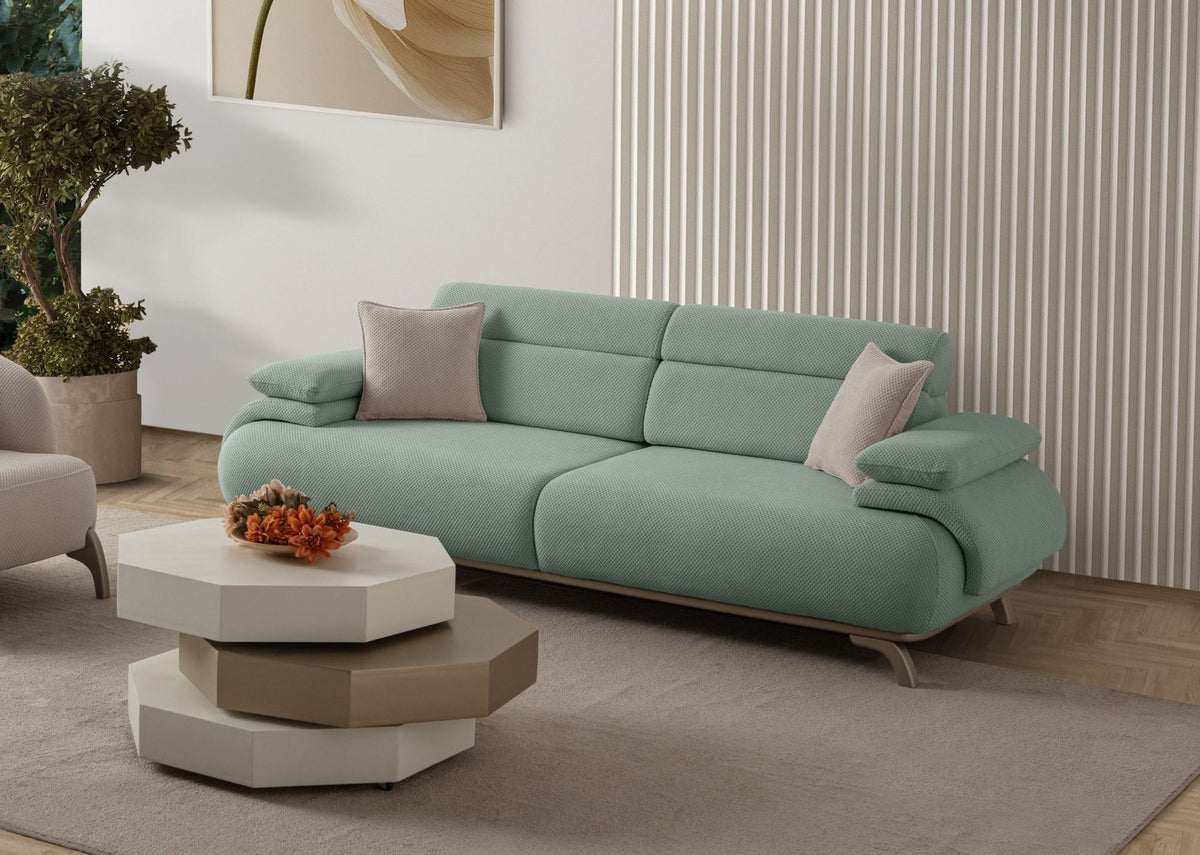 Seegrünes 3-Sitzer-Sofa Bonjo Silver von Hanah Home mit Polyesterbezug, Holzbeinen und zwei losen Kissen, Frontalansicht des Möbelstücks.