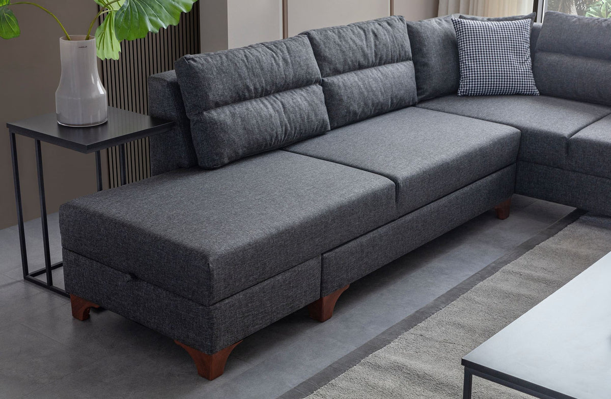 Eckschlafsofa T-Loft rechts in Anthrazit von Hanah Home, Stoffbezug mit Leinenstruktur, Kunststoffbeine, inklusive acht Kissen.