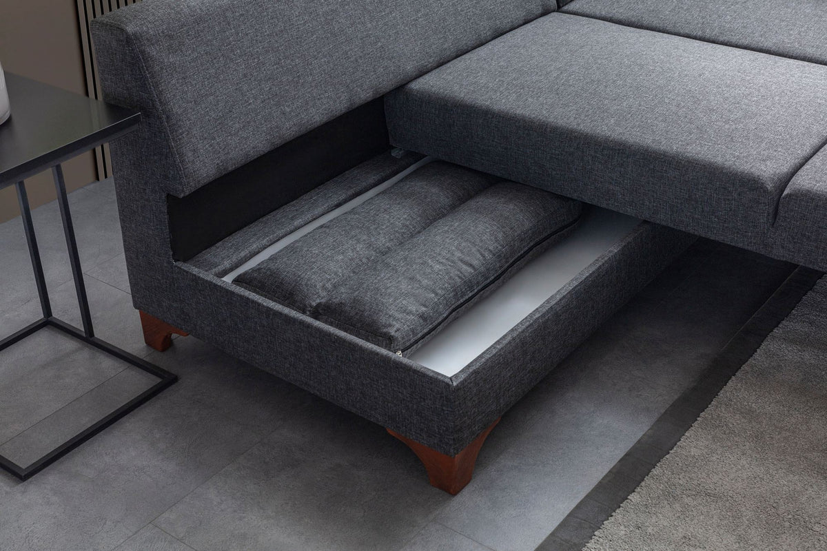 Eckschlafsofa T-Loft rechts in Anthrazit von Hanah Home, Stoffbezug mit Leinenstruktur, Kunststoffbeine, inklusive acht Kissen.