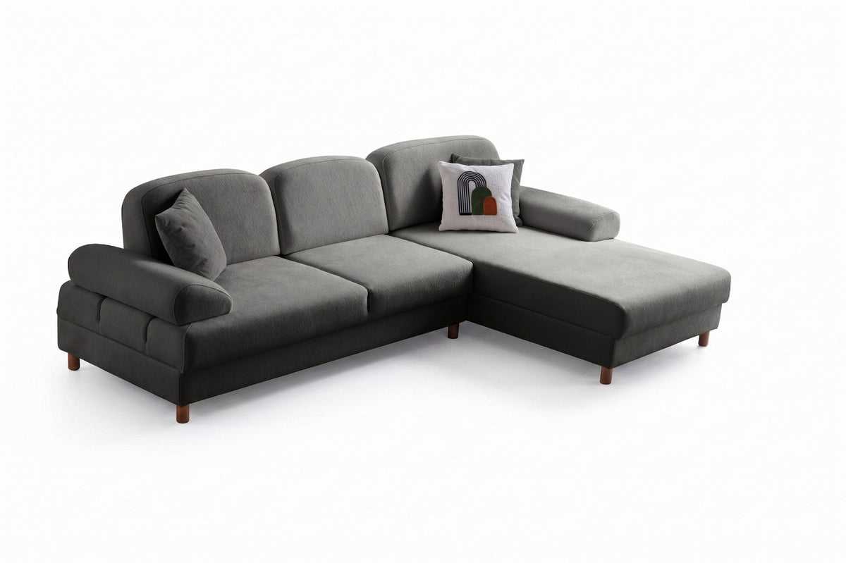 Anthrazitfarbenes Eck-Schlafsofa Aries von Hanah Home mit Coco-Boucle-Bezug, Holzbeinen und ausklappbarer Liegefläche in Wohnraumumgebung.
