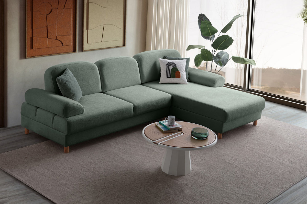 Grünes Eck-Schlafsofa Aries von Hanah Home mit Coco-Boucle-Stoff, Holzbeinen und Aufbewahrungstruhe, rechts ausgerichtet.