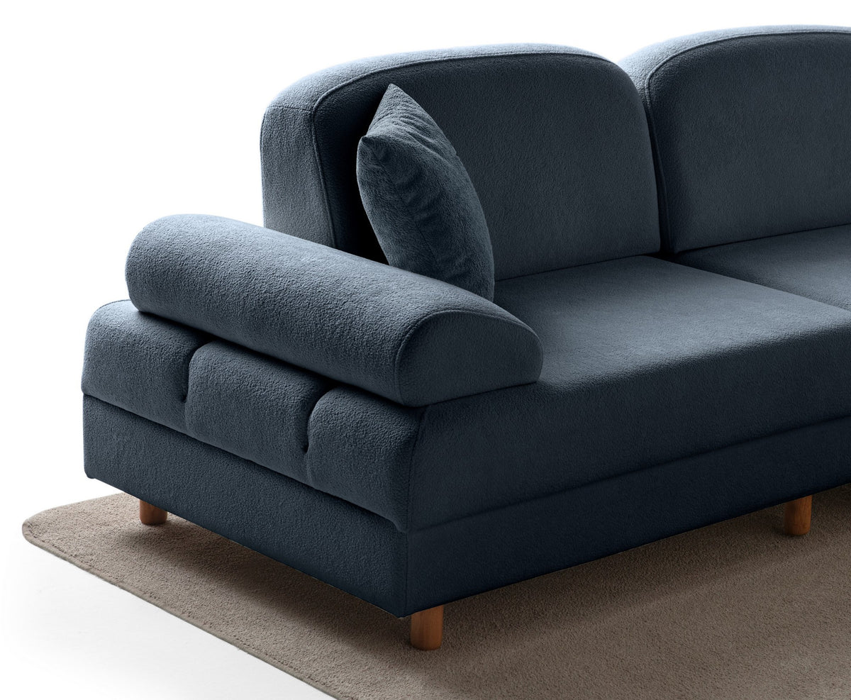Marineblaues Eck-Schlafsofa Aries Modular S von Hanah Home mit Coco-Boucle-Stoff, Holzbeinen und integrierter Aufbewahrungsbox, aufgenommen im Wohnraum