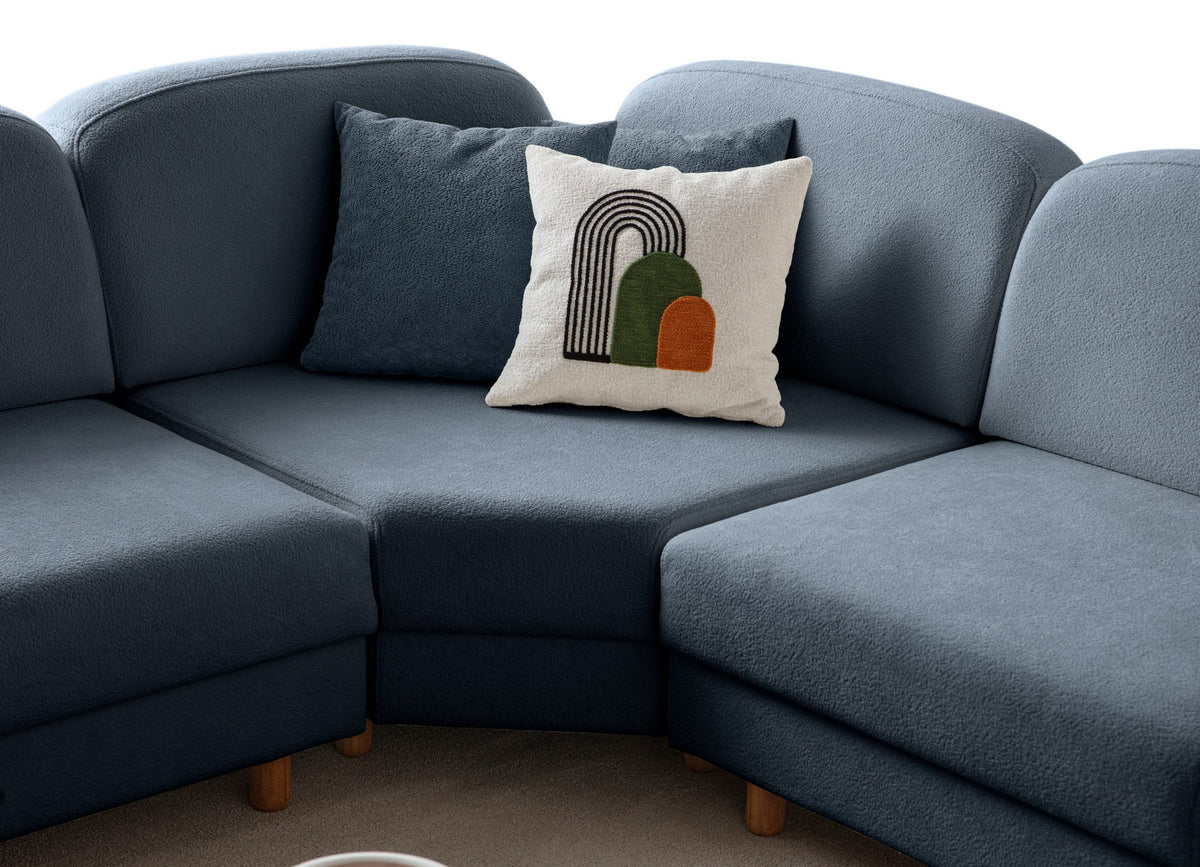 Marineblaues Eck-Schlafsofa Aries Modular M von Hanah Home mit Coco-Boucle-Stoffbezug, Holzbeinen und ausklappbarer Liegefläche.