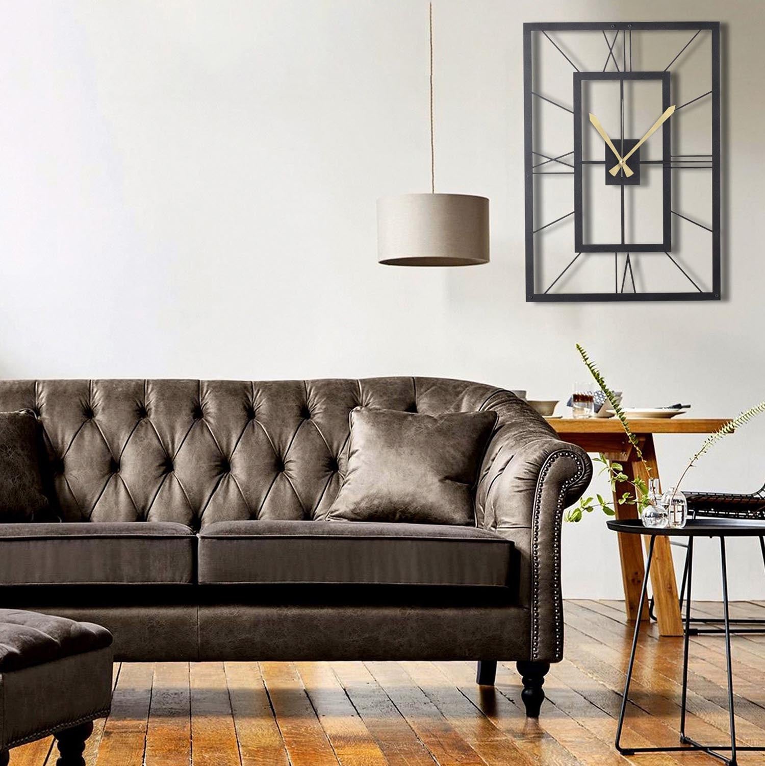 Verleihen Sie Ihrem Raum mit der eleganten Wanduhr "November" von Wallity einen Hauch von Stil. Diese schwarze Metalluhr (49x34,5 cm) ist langlebig und ein echter Hingucker.