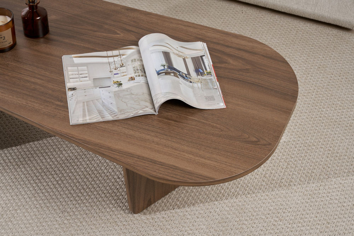 Ovaler Couchtisch in Nussbaumfarbe mit Melaminbeschichtung, Masse 130 x 65 x 40 cm, Modell Ovalis von Nordure.