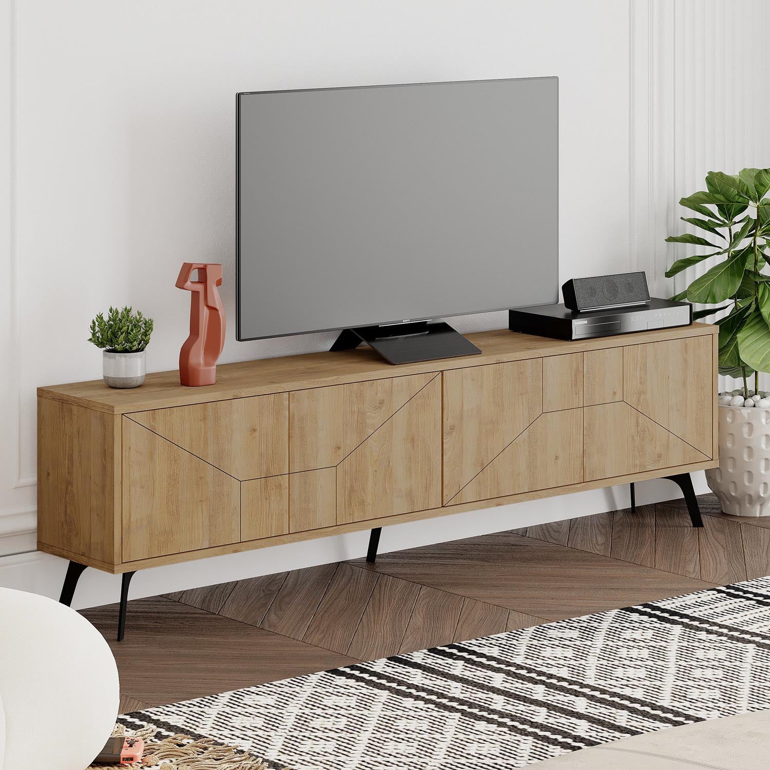 Verleihen Sie Ihrem Wohnraum mit dem Dune Sideboard in Eiche von Hanah Home einen modernen Akzent. Stilvoll und praktisch zugleich!