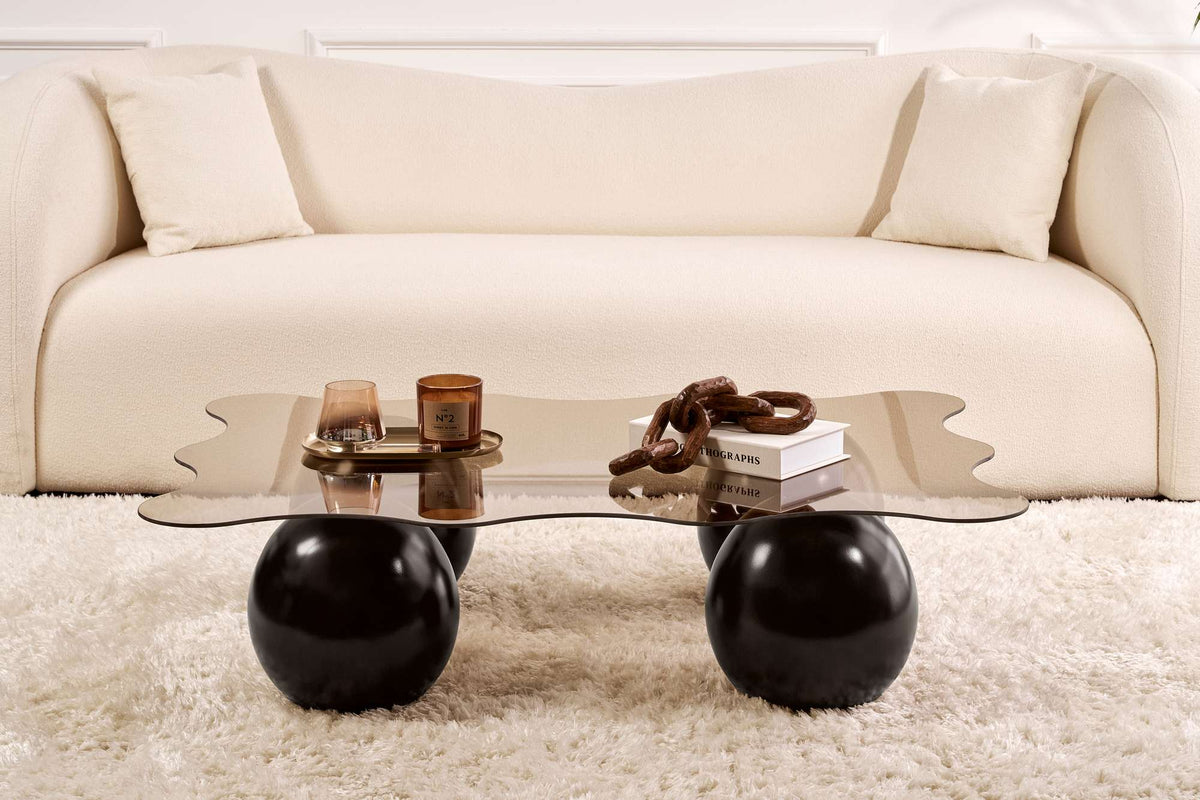 Noxa Sofatisch - Schwarz
Bronze in Schwarz / Bronze präsentiert im Onlineshop von KAQTU Design AG. Couchtisch ist von Nordure