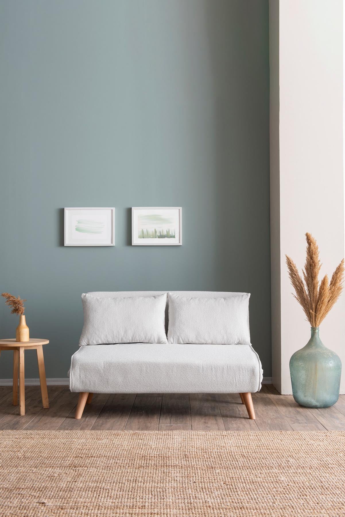 Entdecken Sie das Folde 2 Bettsofa in stilvollem Weiß – ein elegantes Schlafsofa mit robustem Metallrahmen und luxuriösem Teddy-Stoff für höchsten Komfort.