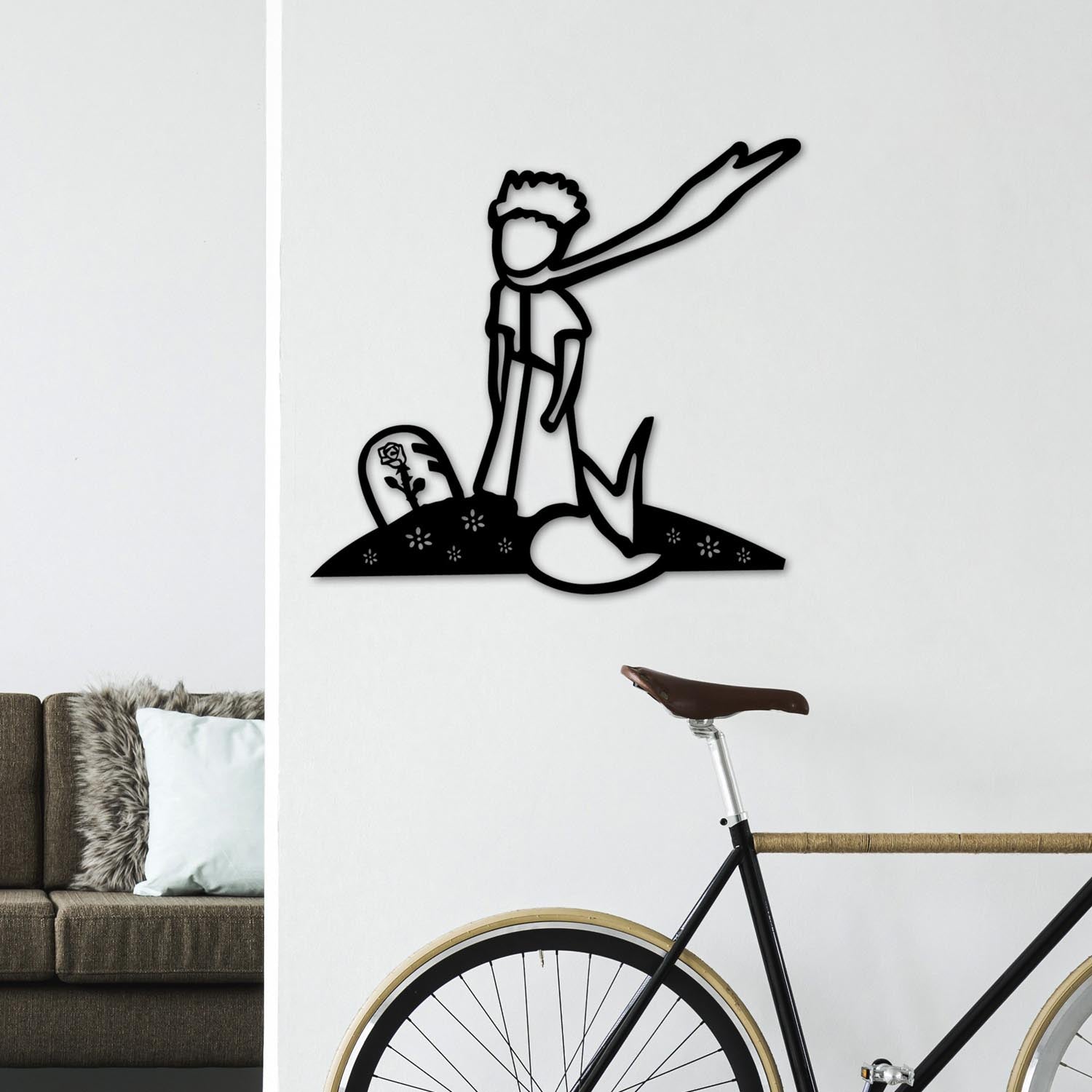 Entdecken Sie die elegante Wanddeko "The Little Prince" in Schwarz von Wallity. Ein zeitloses Kunstwerk, das jeden Raum stilvoll aufwertet.