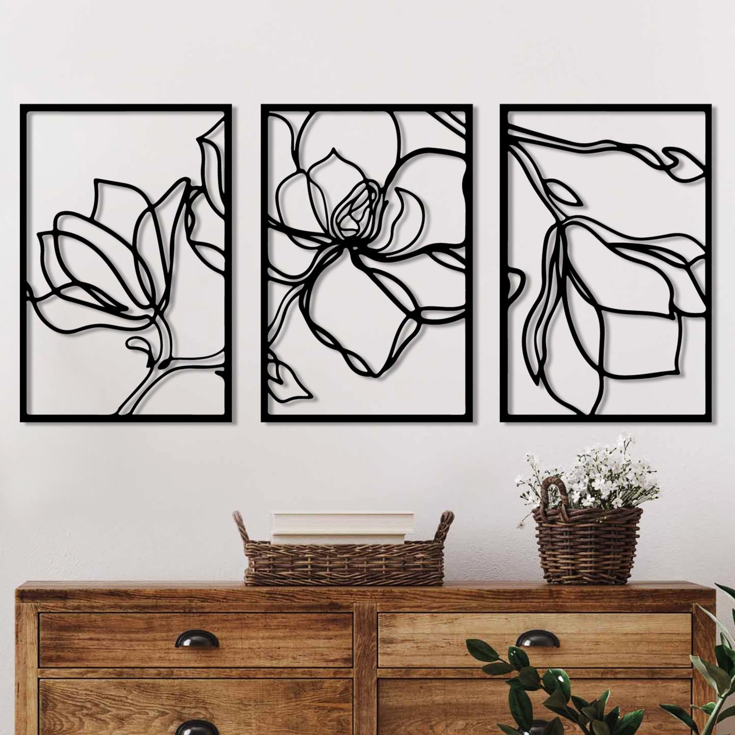 Entdecken Sie die elegante Erbas Wanddeko in Schwarz von Wallity. Dieses stilvolle Metallaccessoire verwandelt Ihre Wände in ein Kunstwerk.