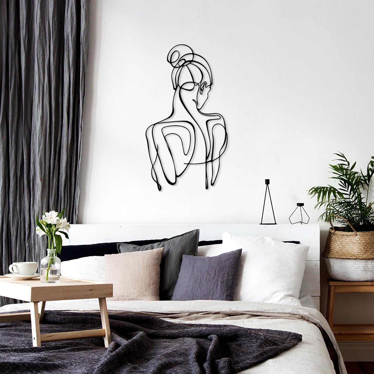 Gestalten Sie Ihre Wände neu mit der Sorella Wanddeko von Wallity. Robustes Metall, stilvolles Design und einfache Installation für jeden Raum!