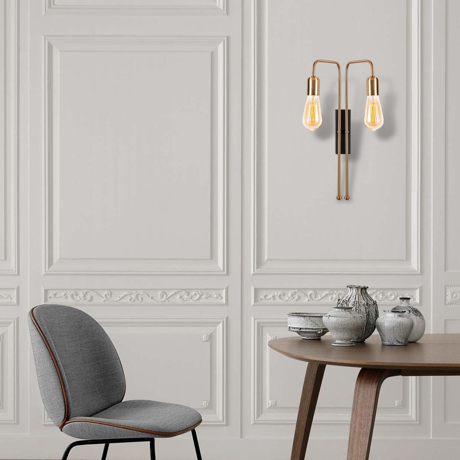 Entdecken Sie die Mum Wandleuchte in Gold und Schwarz von Opviq – ein stilvolles Highlight für jedes Zuhause, das Eleganz und modernes Design vereint.