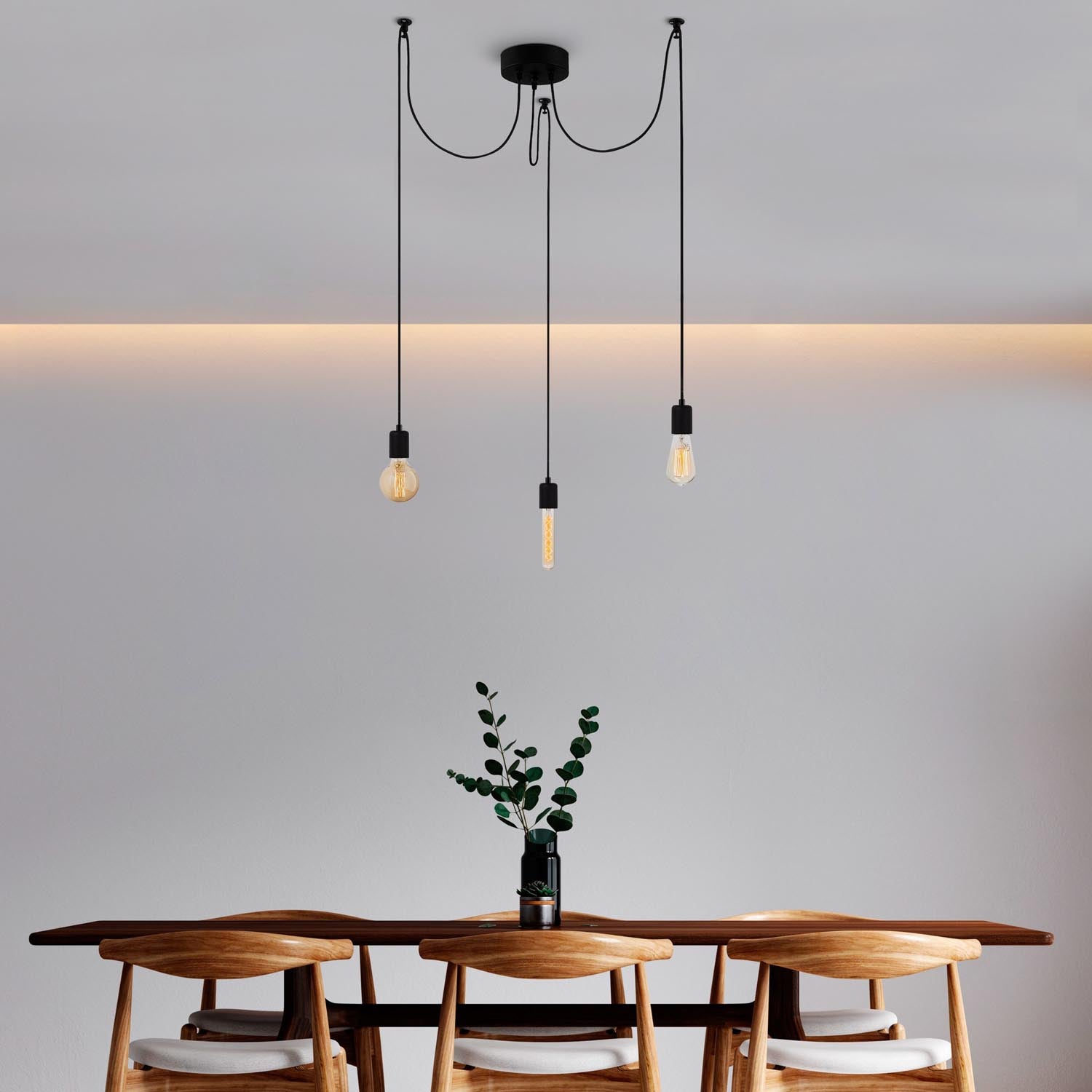 Die Kabluni Pendelleuchte von Opviq in elegantem Schwarz bringt industriellen Charme und moderne Raffinesse in Ihr Zuhause.