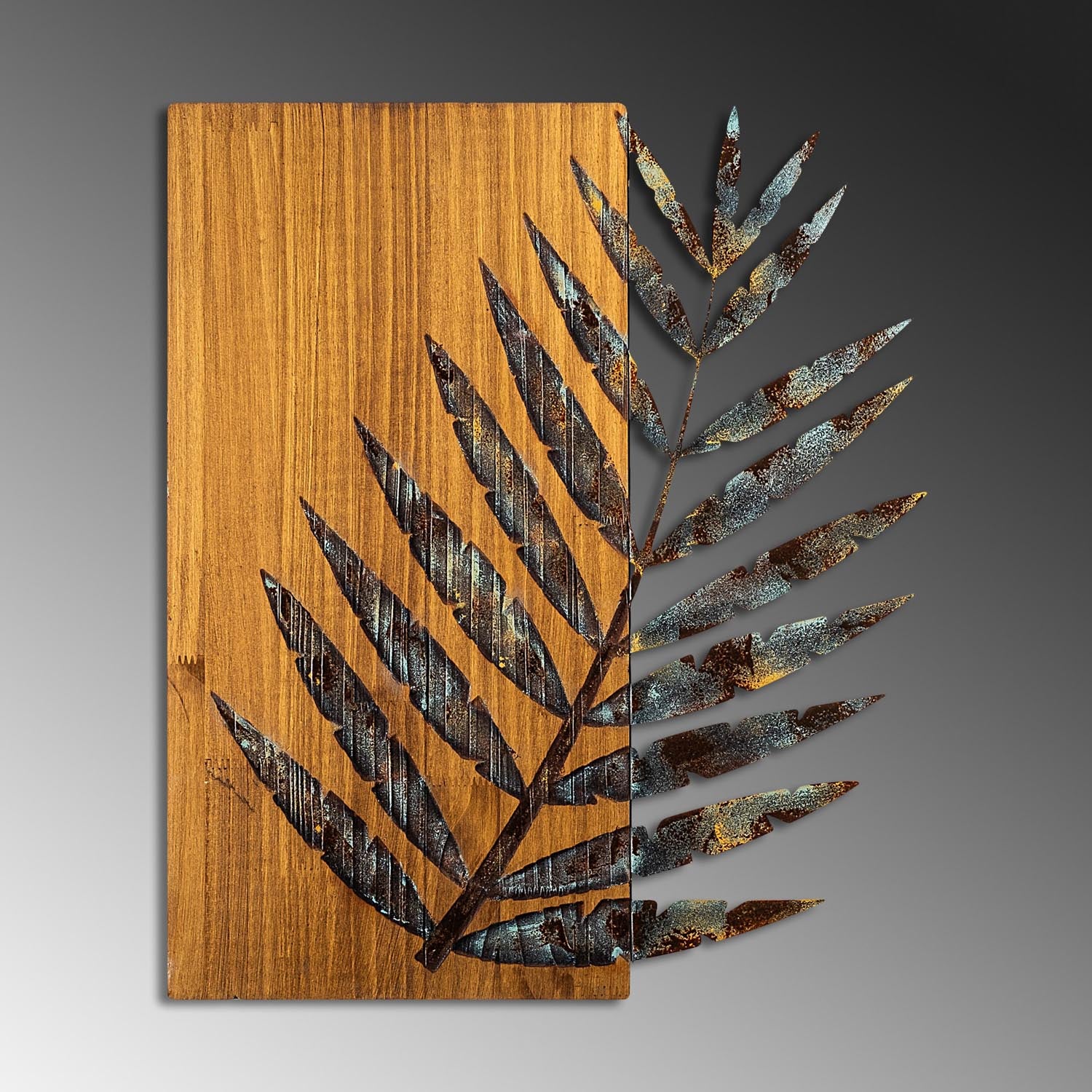 Verleihen Sie Ihrem Zuhause mit der Leaf 3 Wanddeko von Wallity einen Hauch von Eleganz. Handgemalt und aus 100% Holz, ist sie der perfekte Blickfang.