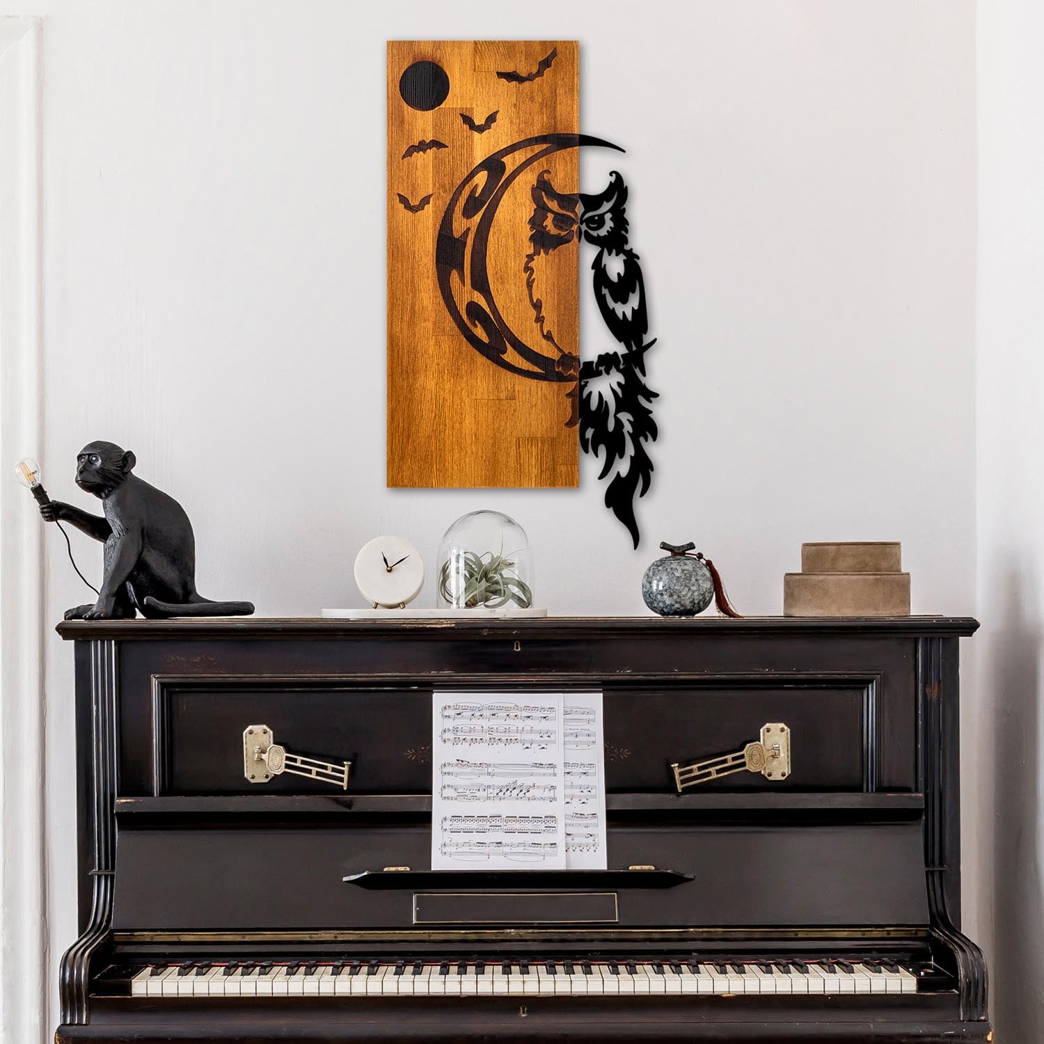 Verleihen Sie Ihrem Zuhause mit der Owl Wanddeko in Walnuss Schwarz von Wallity einen Hauch von Eleganz und natürlicher Schönheit.