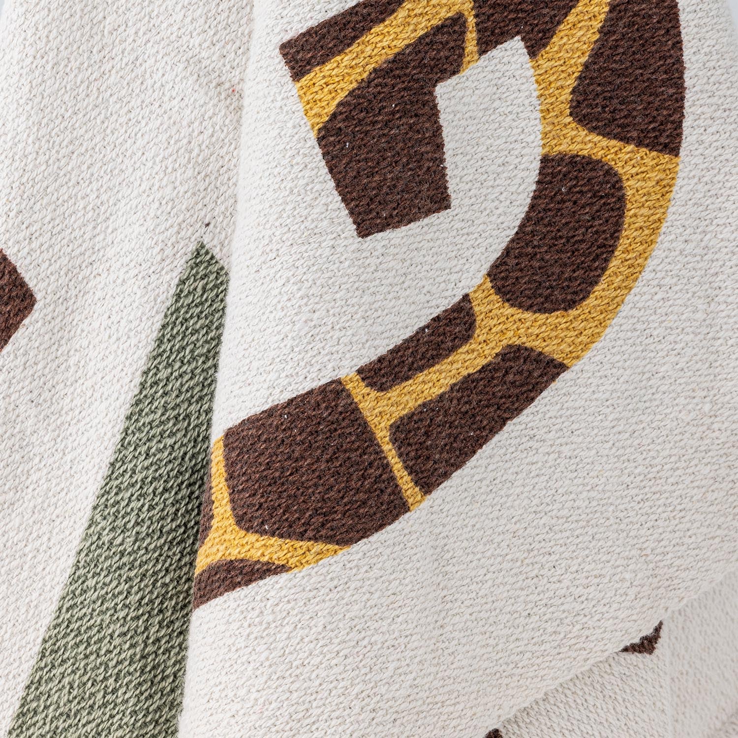 Entdecken Sie die stilvolle Memmo Decke von Bloomingville Mini. Hergestellt aus recycelter Baumwolle, bringt sie Nachhaltigkeit und Gemütlichkeit in Ihr Zuhause.