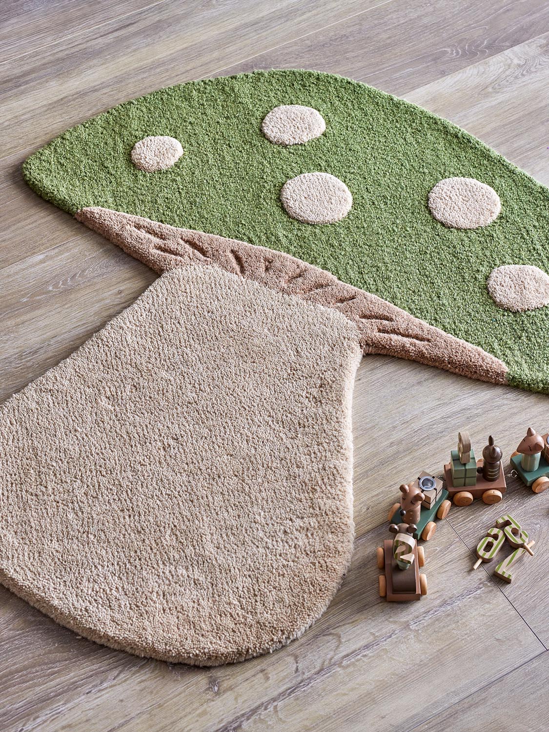 Mushroom Teppich, Grün, Wolle in Green präsentiert im Onlineshop von KAQTU Design AG. Teppich ist von Bloomingville Mini