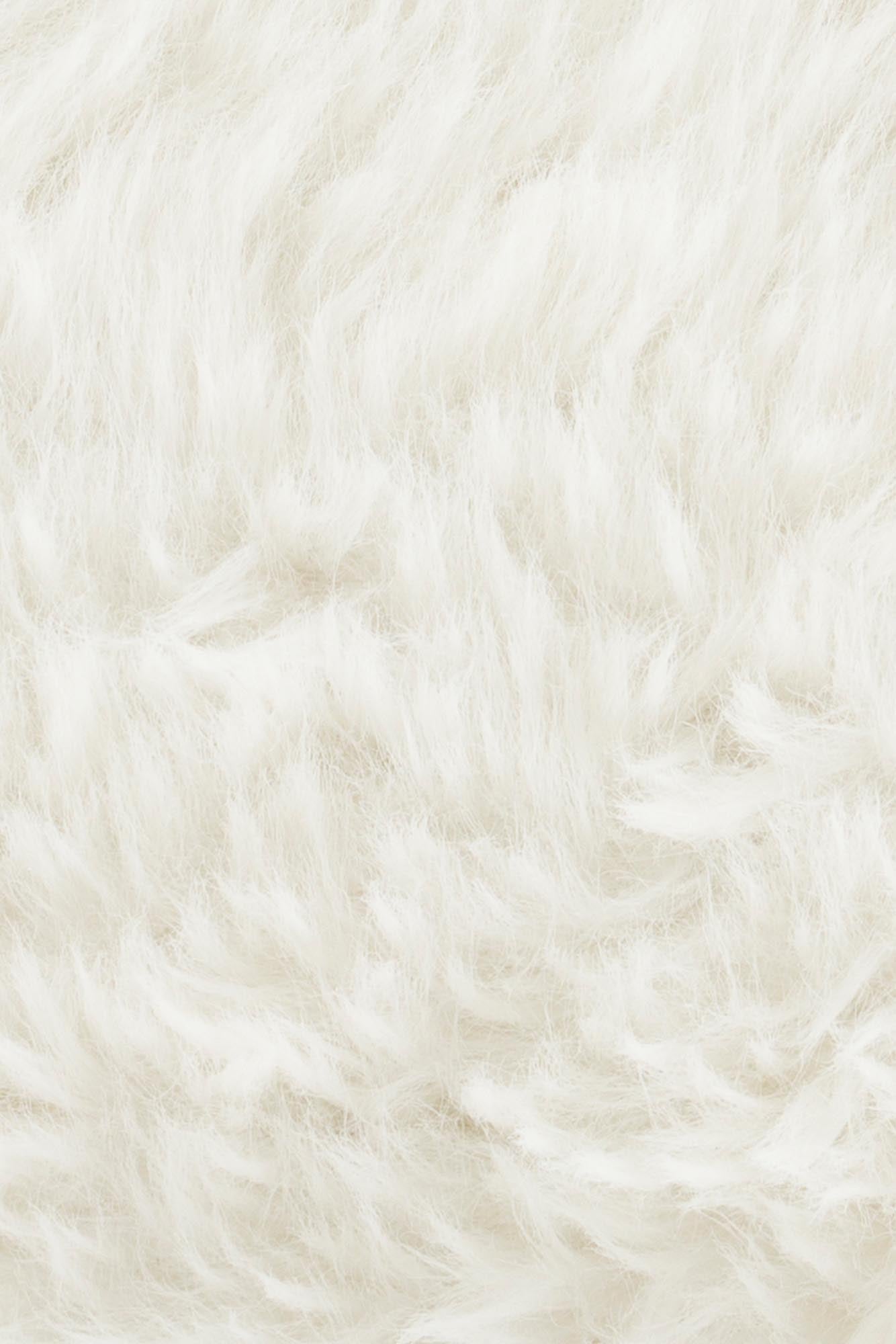 Entspannen Sie im Lounge Stuhl Cuddle the Yeti von Bold Monkey – ein einzigartiger, plüschiger Sessel, der Komfort und Eleganz perfekt kombiniert.