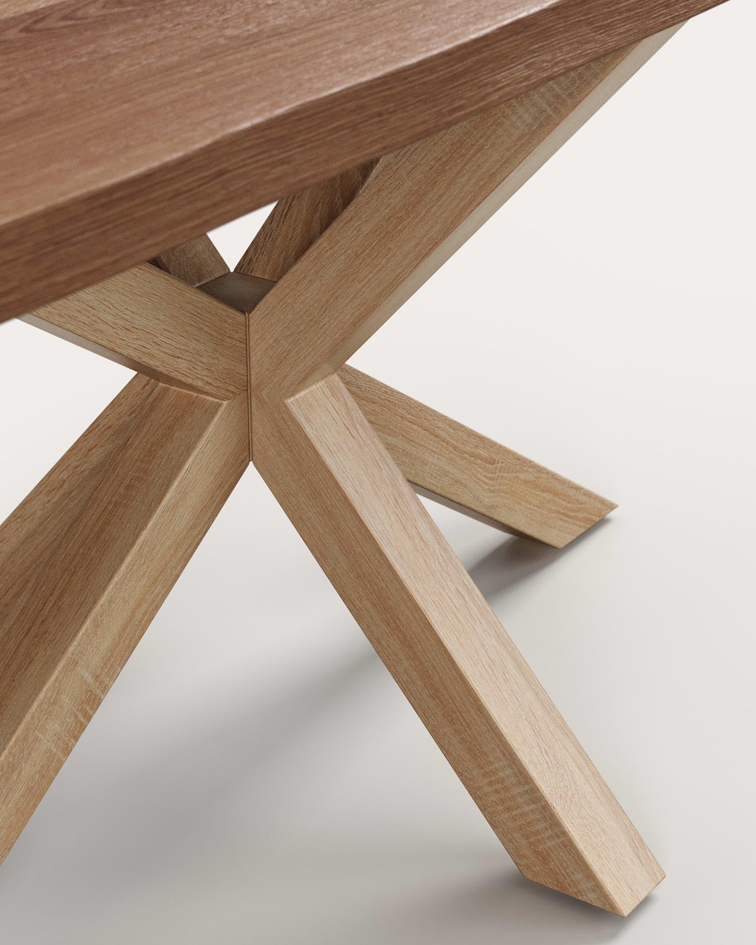 Entdecken Sie den eleganten Tisch Argo: Gealtertes Eichenfurnier trifft auf stabile Stahlbeine in Holzoptik. Ideal für gesellige Essmomente!