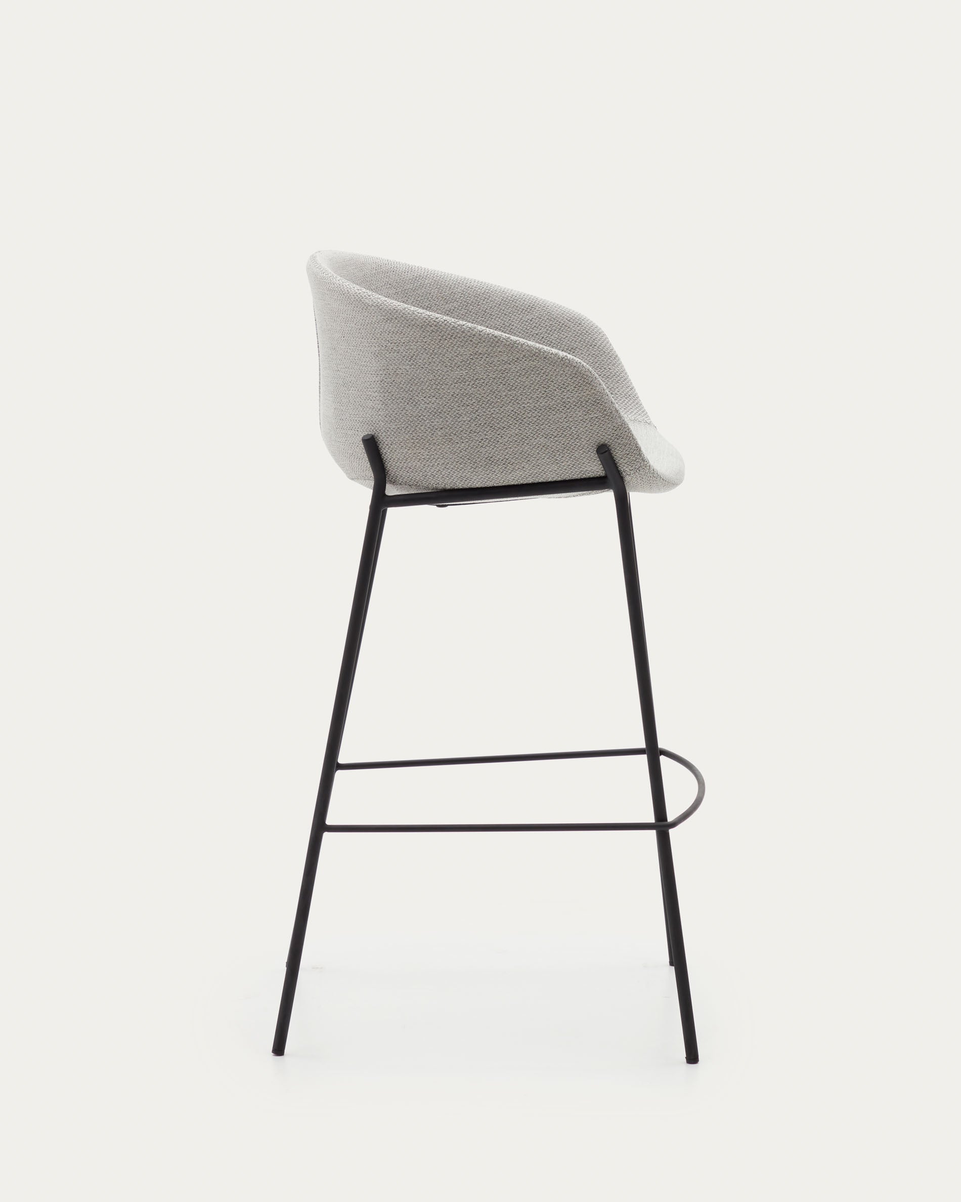 Eleganter Hocker Yvette mit hellgrauem Polster und schwarzen Stahlbeinen, 75 cm hoch, perfekt für moderne Wohnräume.